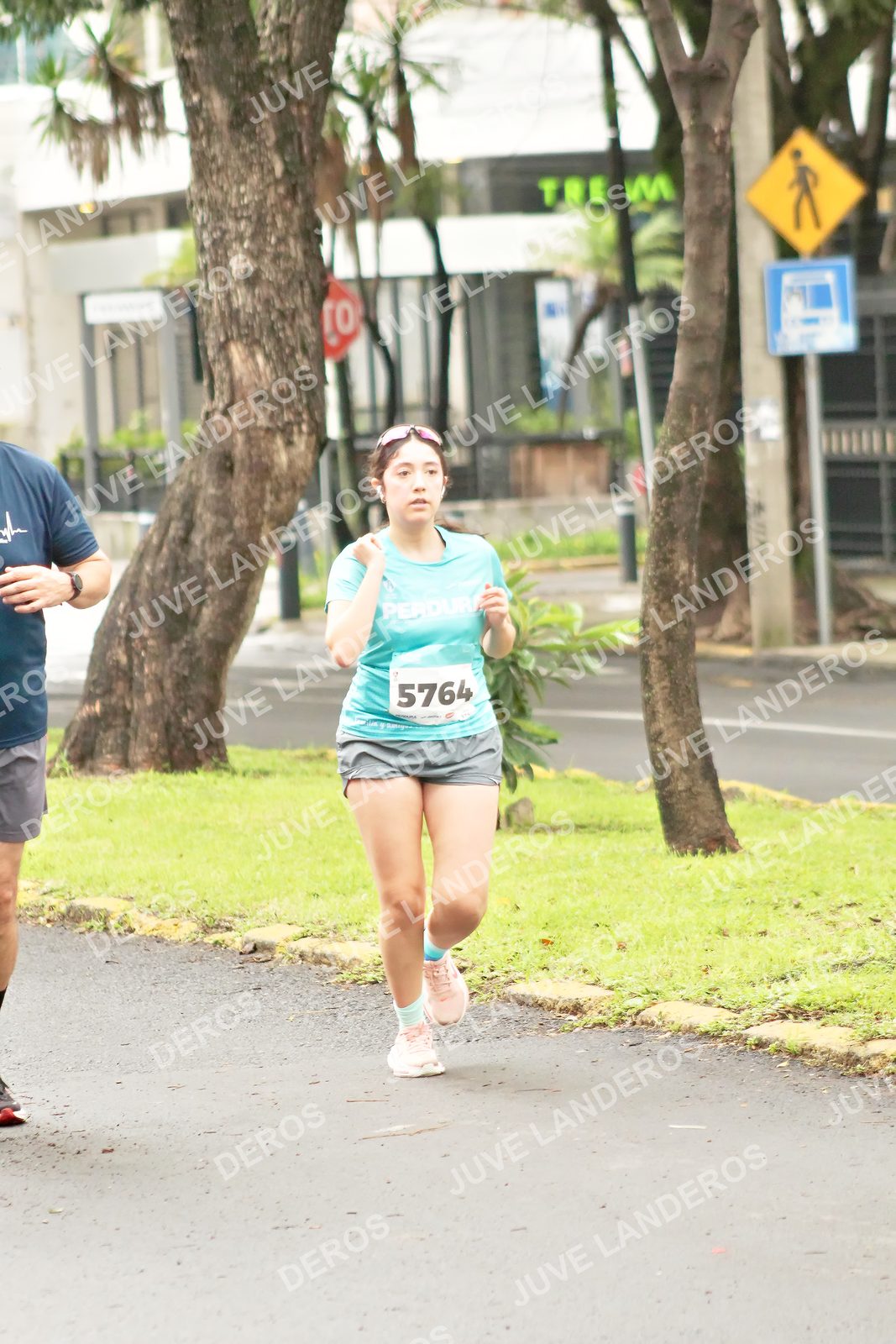 Foto del MEDIO MARATÓN ATLAS en Av. Patria, frente al Parque El Polvorín, Zapopan a las 08:52 · dorsal 5764