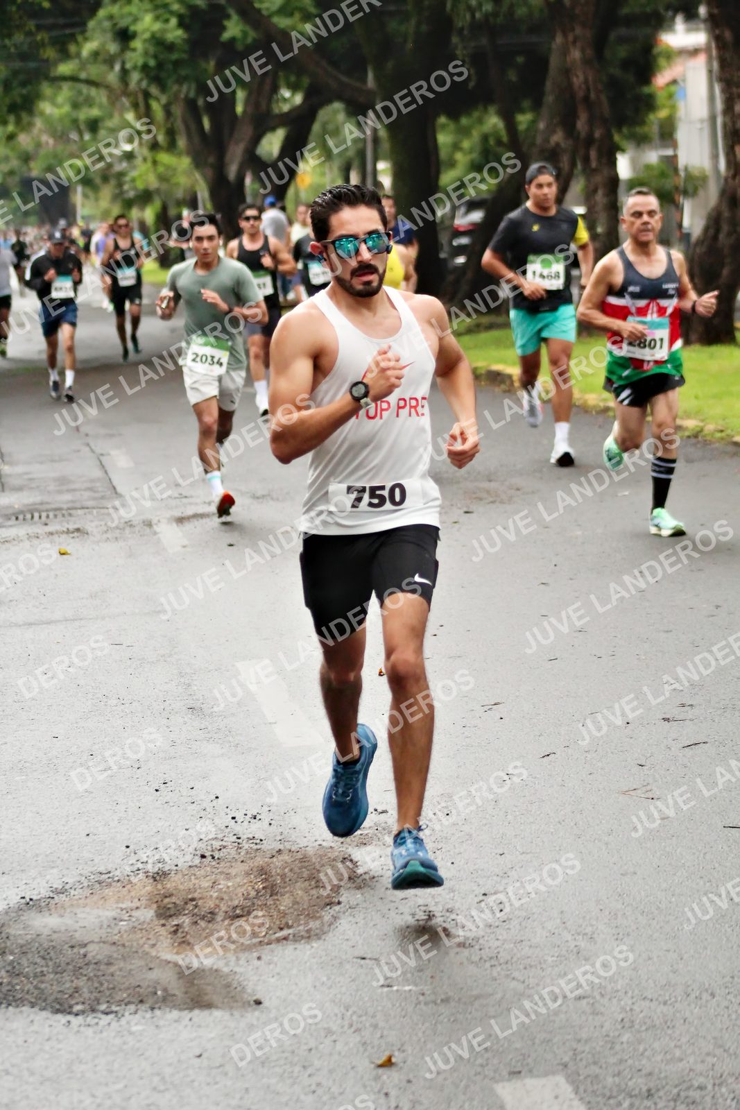Foto del MEDIO MARATÓN ATLAS en Av. Patria, frente al Parque El Polvorín, Zapopan a las 08:09 · dorsal 750, 2034, 1468