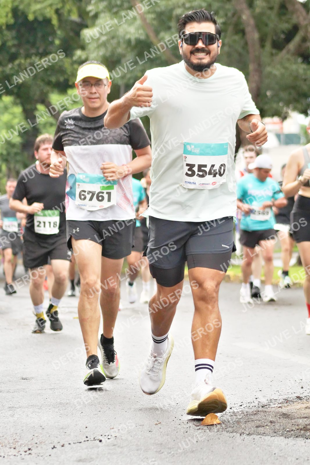 Foto del MEDIO MARATÓN ATLAS en Av. Patria, frente al Parque El Polvorín, Zapopan a las 08:35 · dorsal 3540, 6761, 2118
