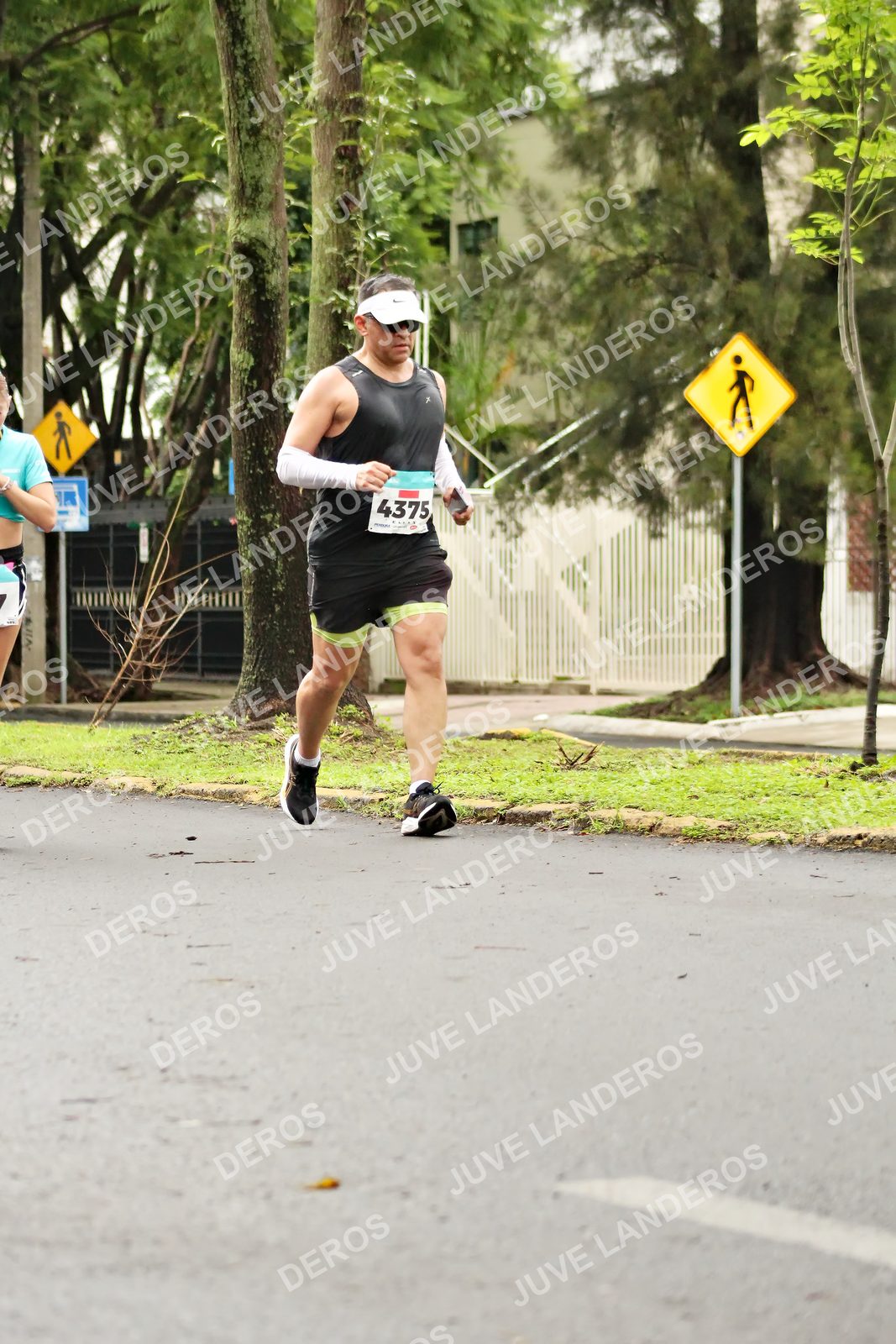 Foto del MEDIO MARATÓN ATLAS en Av. Patria, frente al Parque El Polvorín, Zapopan a las 08:37 · dorsal 4375