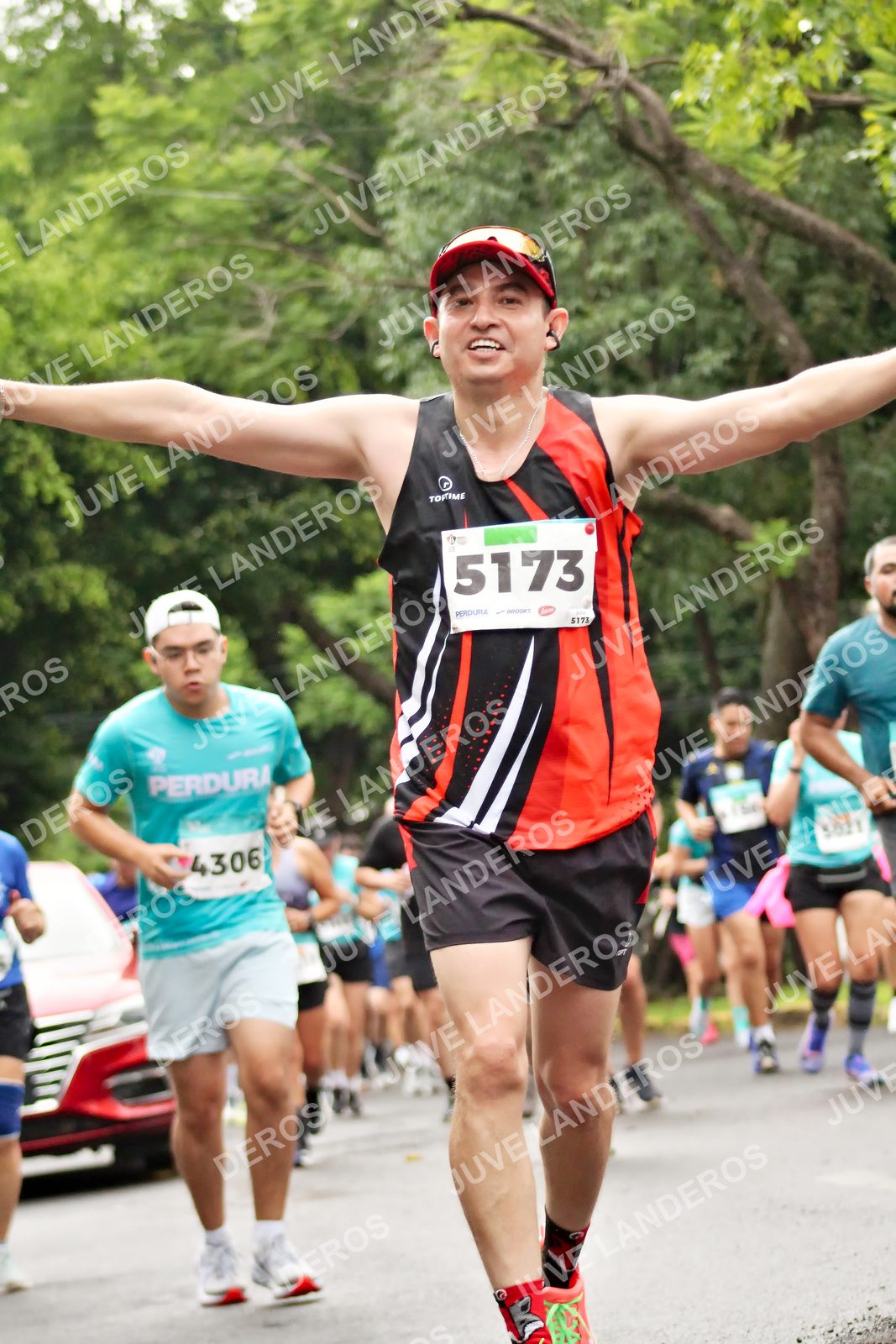 Foto del MEDIO MARATÓN ATLAS en Av. Patria, frente al Parque El Polvorín, Zapopan a las 08:32 · dorsal 5173, 4306