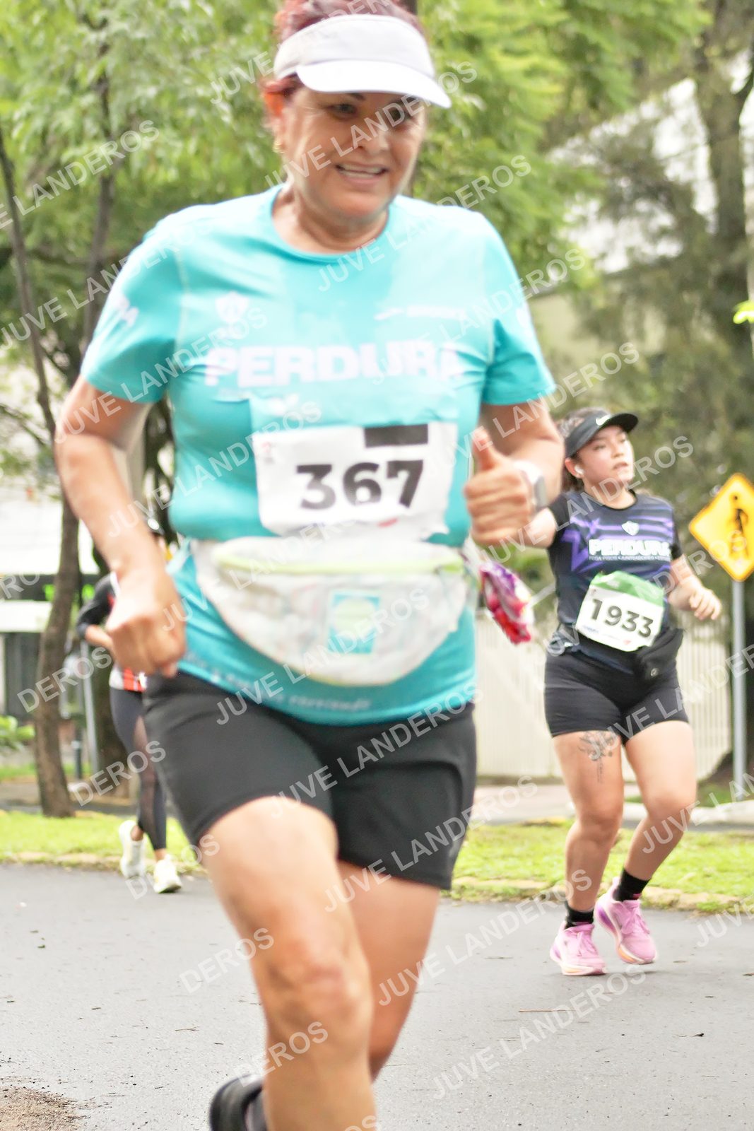 Foto del MEDIO MARATÓN ATLAS en Av. Patria, frente al Parque El Polvorín, Zapopan a las 08:41 · dorsal 367, 1933
