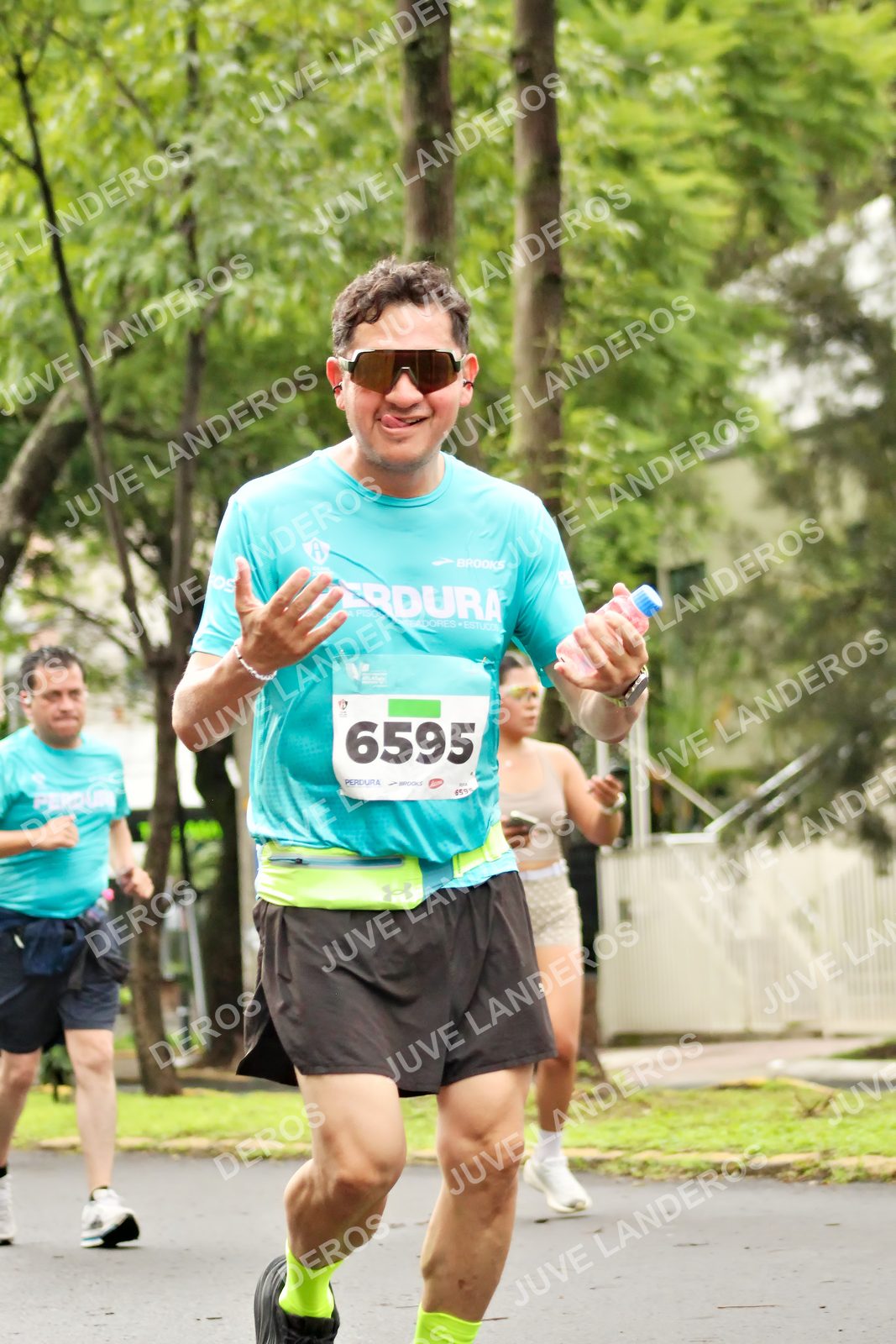 Foto del MEDIO MARATÓN ATLAS en Av. Patria, frente al Parque El Polvorín, Zapopan a las 08:44 · dorsal 6595