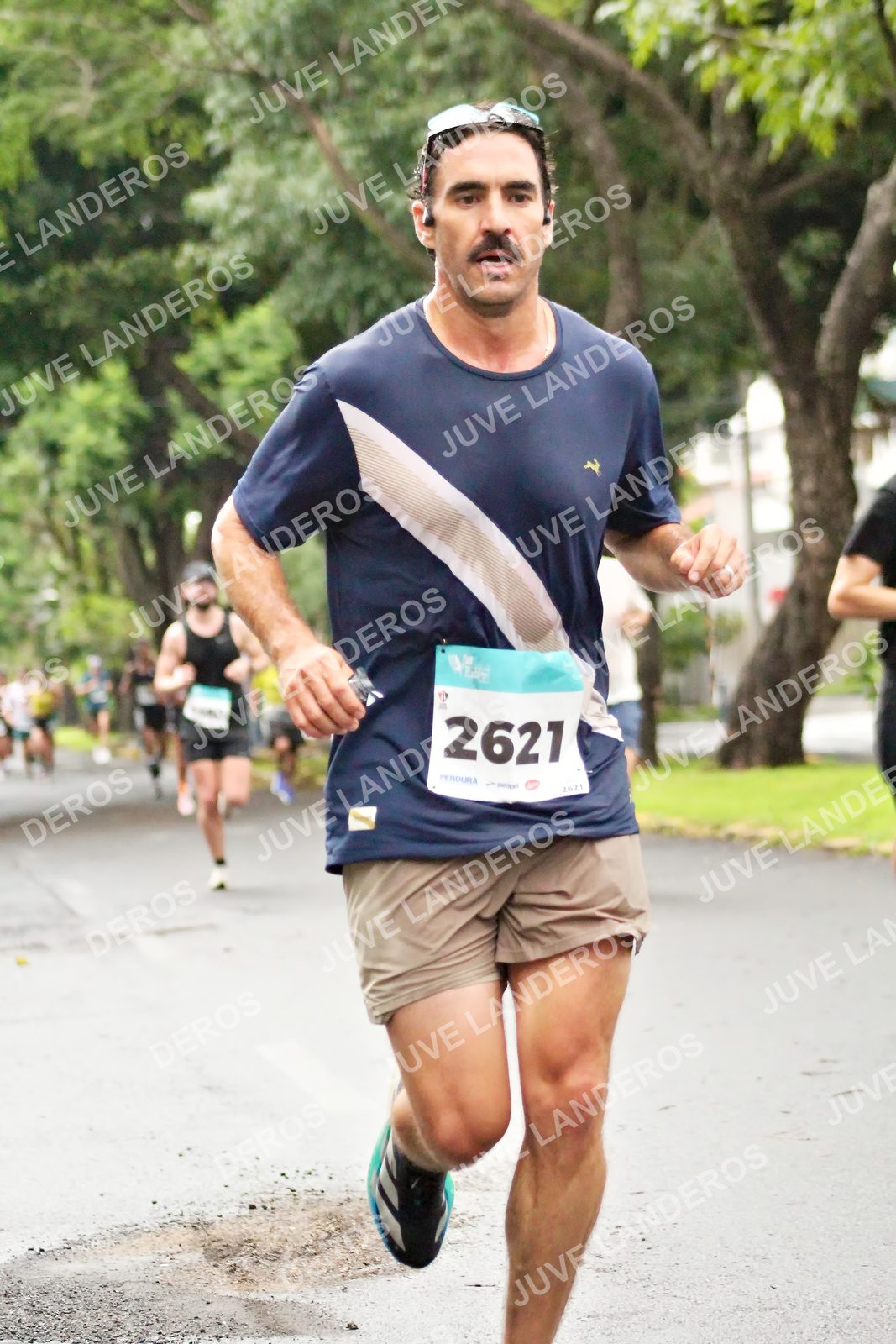 Foto del MEDIO MARATÓN ATLAS en Av. Patria, frente al Parque El Polvorín, Zapopan a las 08:09 · dorsal 2621