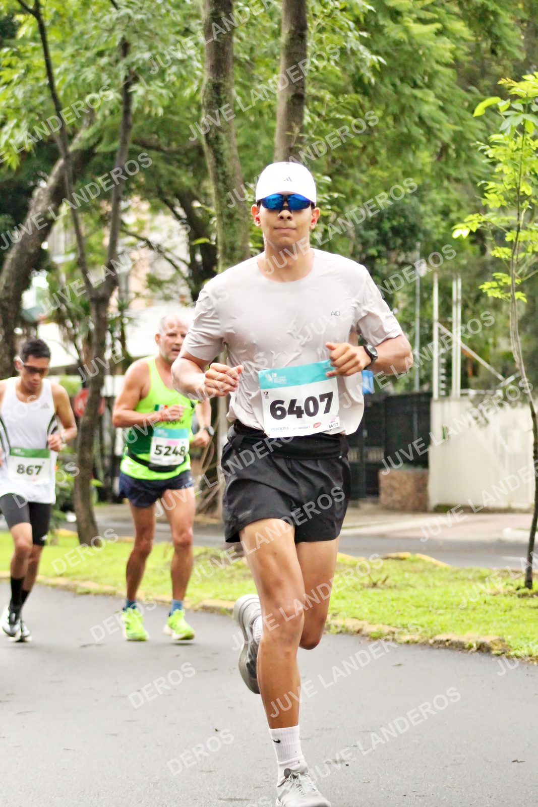 Foto del MEDIO MARATÓN ATLAS en Av. Patria, frente al Parque El Polvorín, Zapopan a las 08:13 · dorsal 6407, 5248, 867