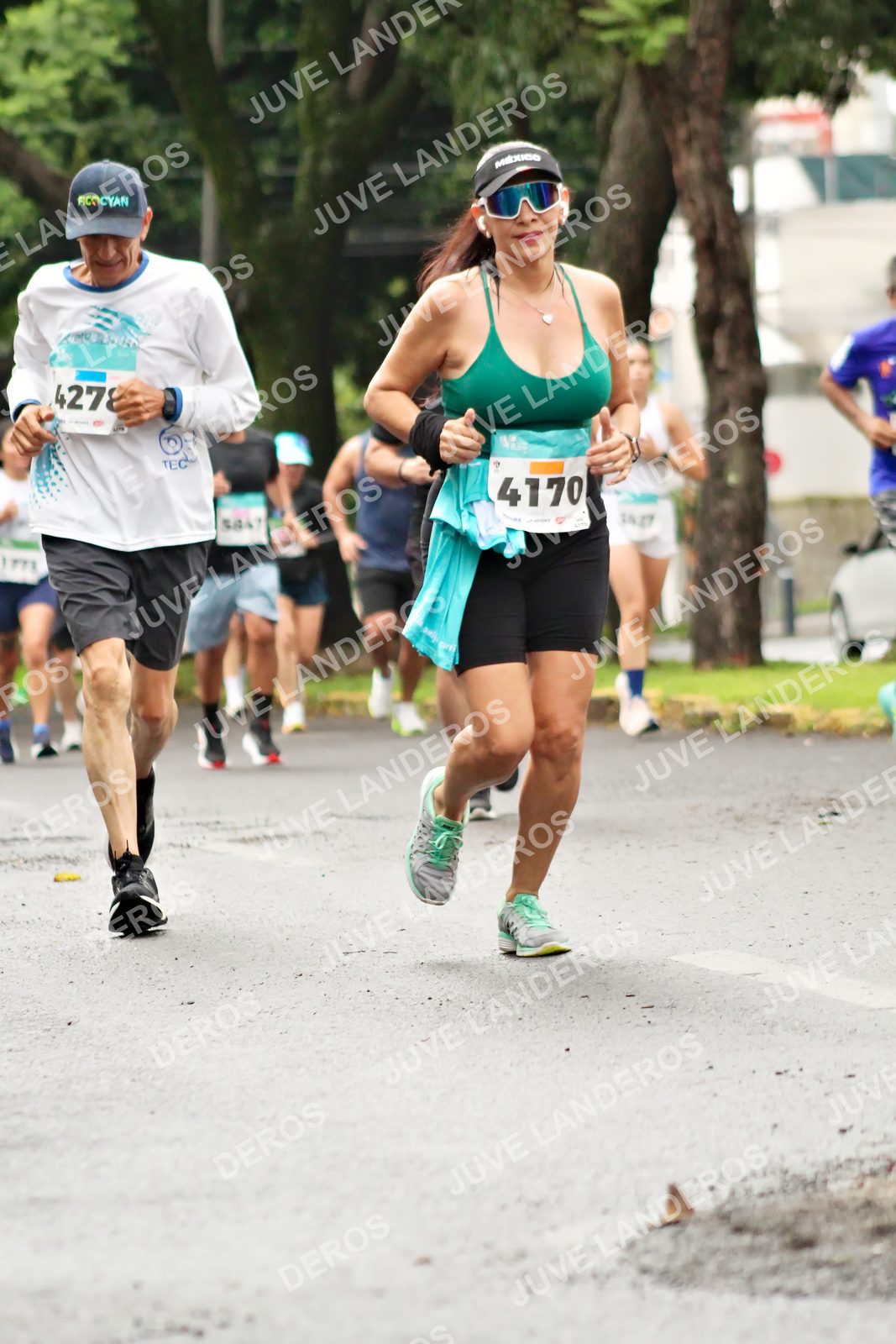 Foto del MEDIO MARATÓN ATLAS en Av. Patria, frente al Parque El Polvorín, Zapopan a las 08:29 · dorsal 4170, 4278