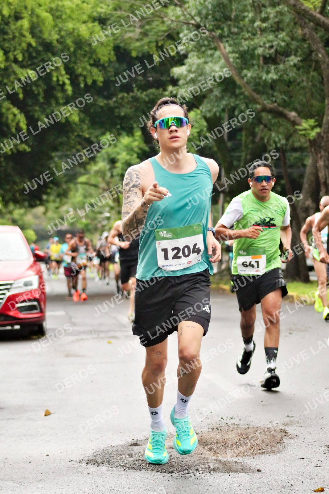 Foto del MEDIO MARATÓN ATLAS en Av. Patria, frente al Parque El Polvorín, Zapopan a las 08:13 · dorsal 1204, 641