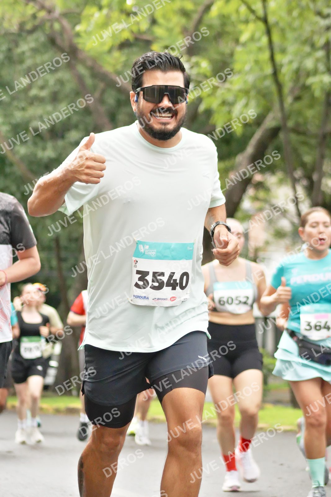 Foto del MEDIO MARATÓN ATLAS en Av. Patria, frente al Parque El Polvorín, Zapopan a las 08:35 · dorsal 3540, 364, 6052