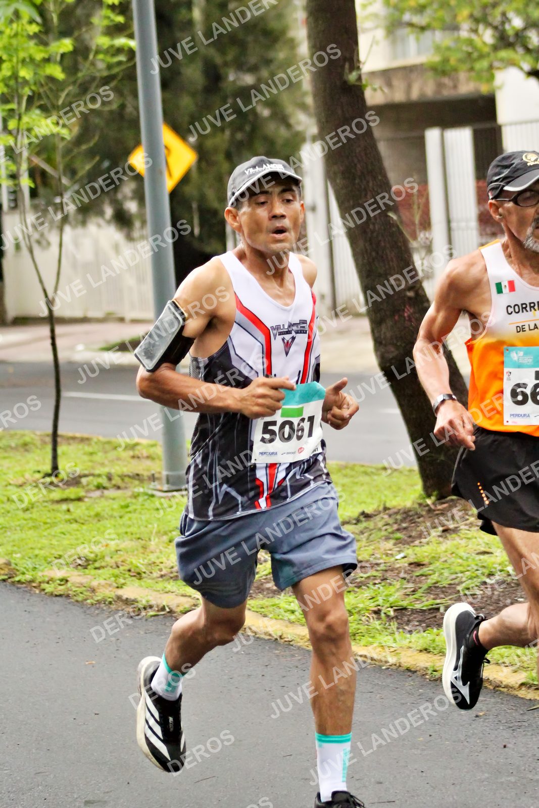 Foto del MEDIO MARATÓN ATLAS en Av. Patria, frente al Parque El Polvorín, Zapopan a las 08:06 · dorsal 5061, 66