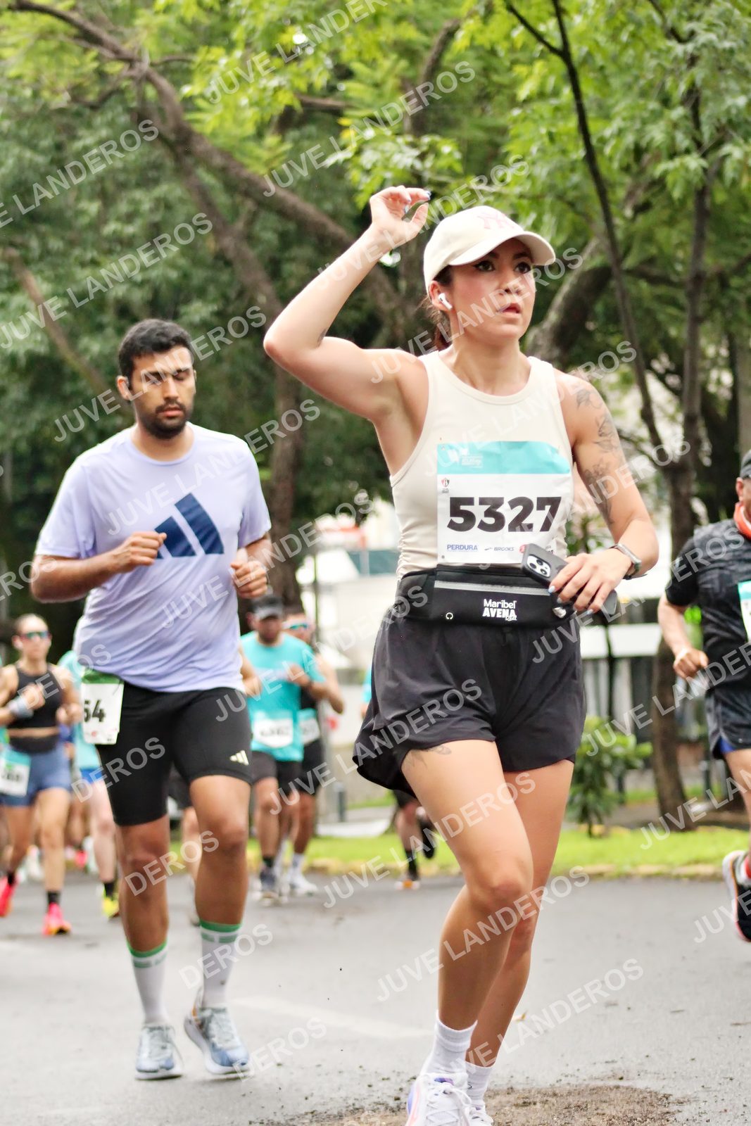 Foto del MEDIO MARATÓN ATLAS en Av. Patria, frente al Parque El Polvorín, Zapopan a las 08:25 · dorsal 5327, 54