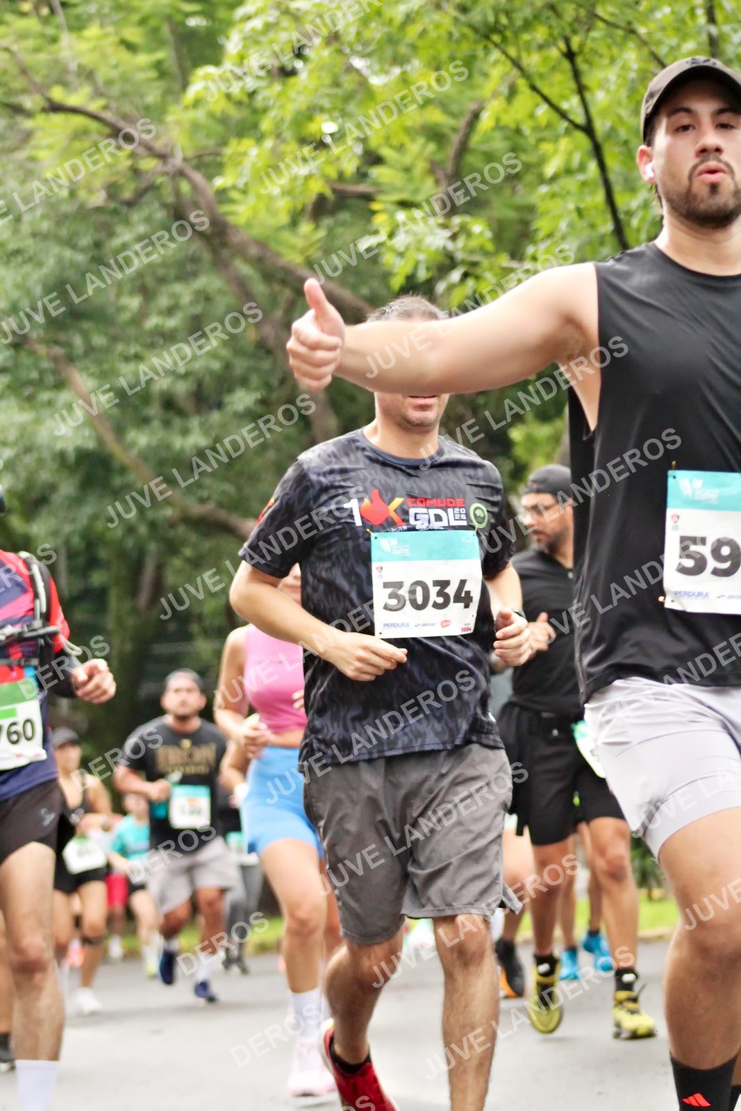 Foto del MEDIO MARATÓN ATLAS en Av. Patria, frente al Parque El Polvorín, Zapopan a las 08:34 · dorsal 59, 3034, 1
