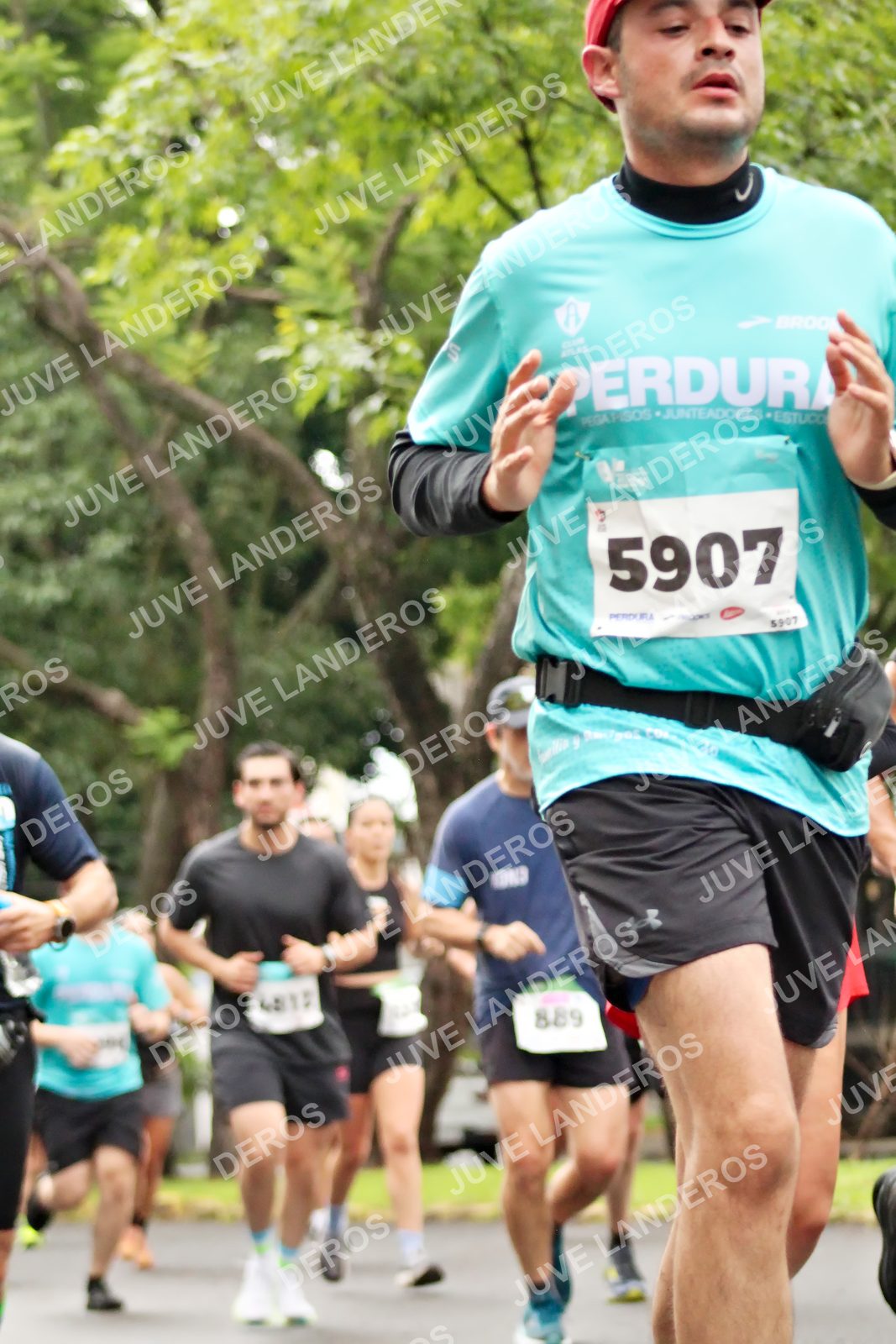 Foto del MEDIO MARATÓN ATLAS en Av. Patria, frente al Parque El Polvorín, Zapopan a las 08:31 · dorsal 5907, 889