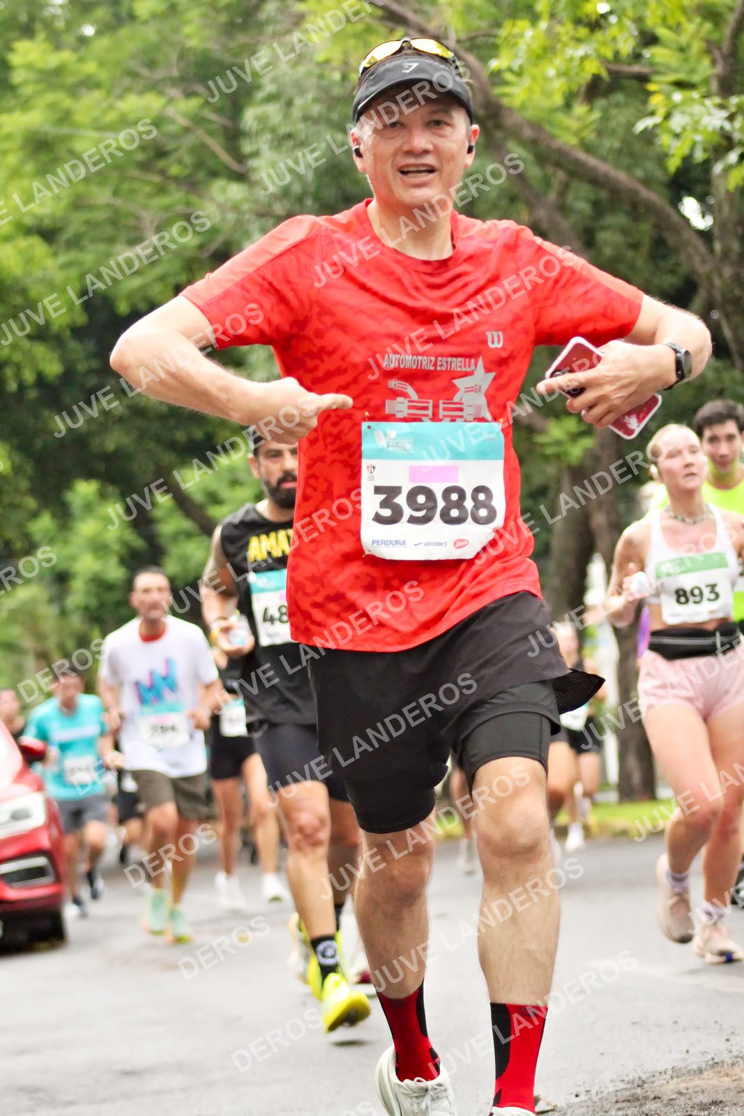 Foto del MEDIO MARATÓN ATLAS en Av. Patria, frente al Parque El Polvorín, Zapopan a las 08:23 · dorsal 3988, 893, 48