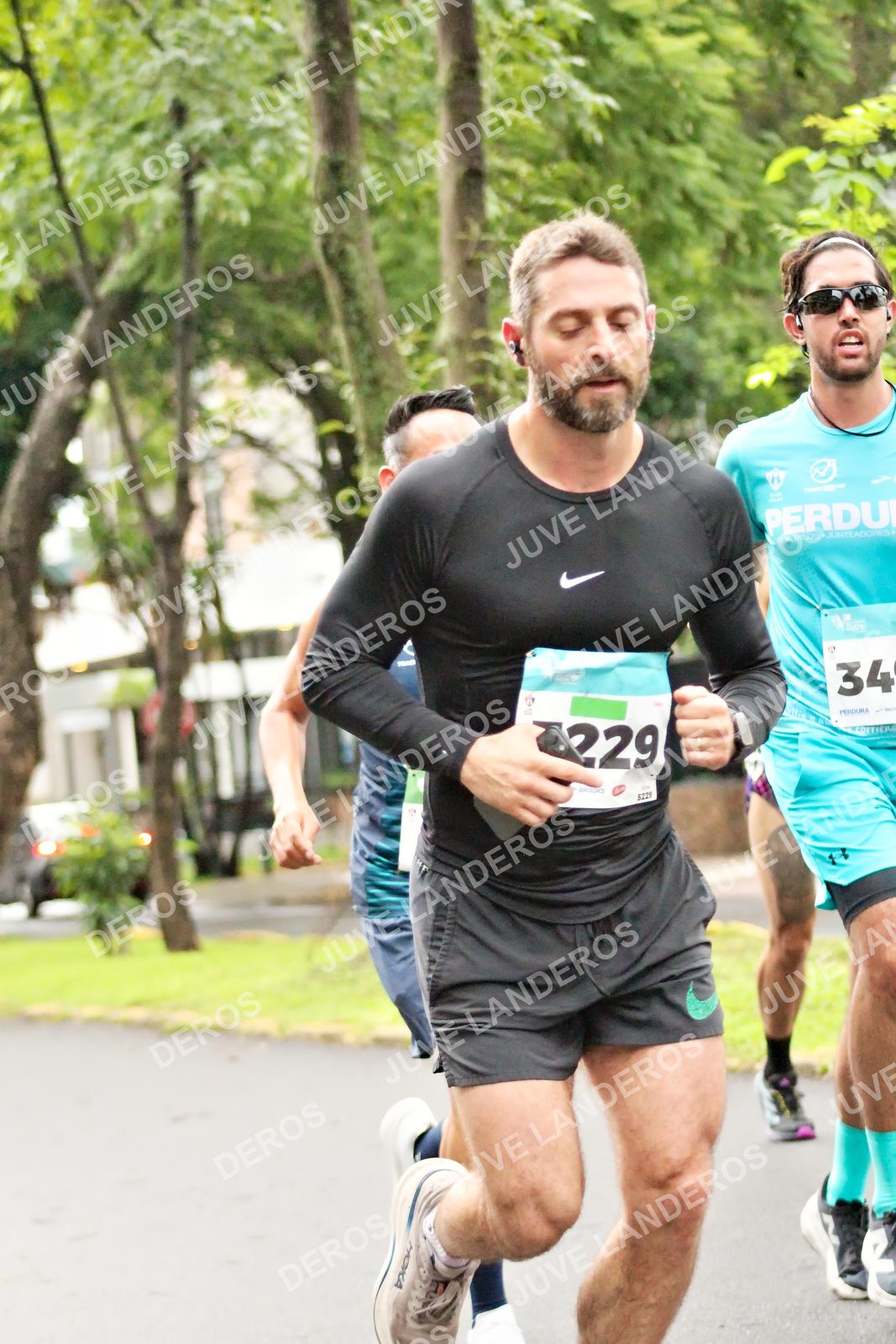 Foto del MEDIO MARATÓN ATLAS en Av. Patria, frente al Parque El Polvorín, Zapopan a las 08:14 · dorsal 34, 229, 5229