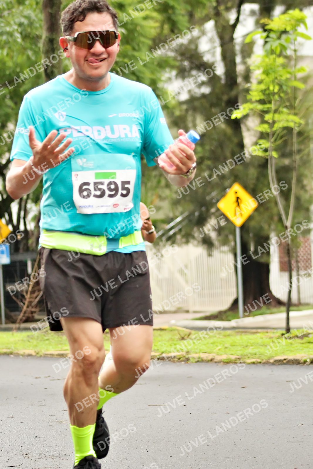 Foto del MEDIO MARATÓN ATLAS en Av. Patria, frente al Parque El Polvorín, Zapopan a las 08:44 · dorsal 6595