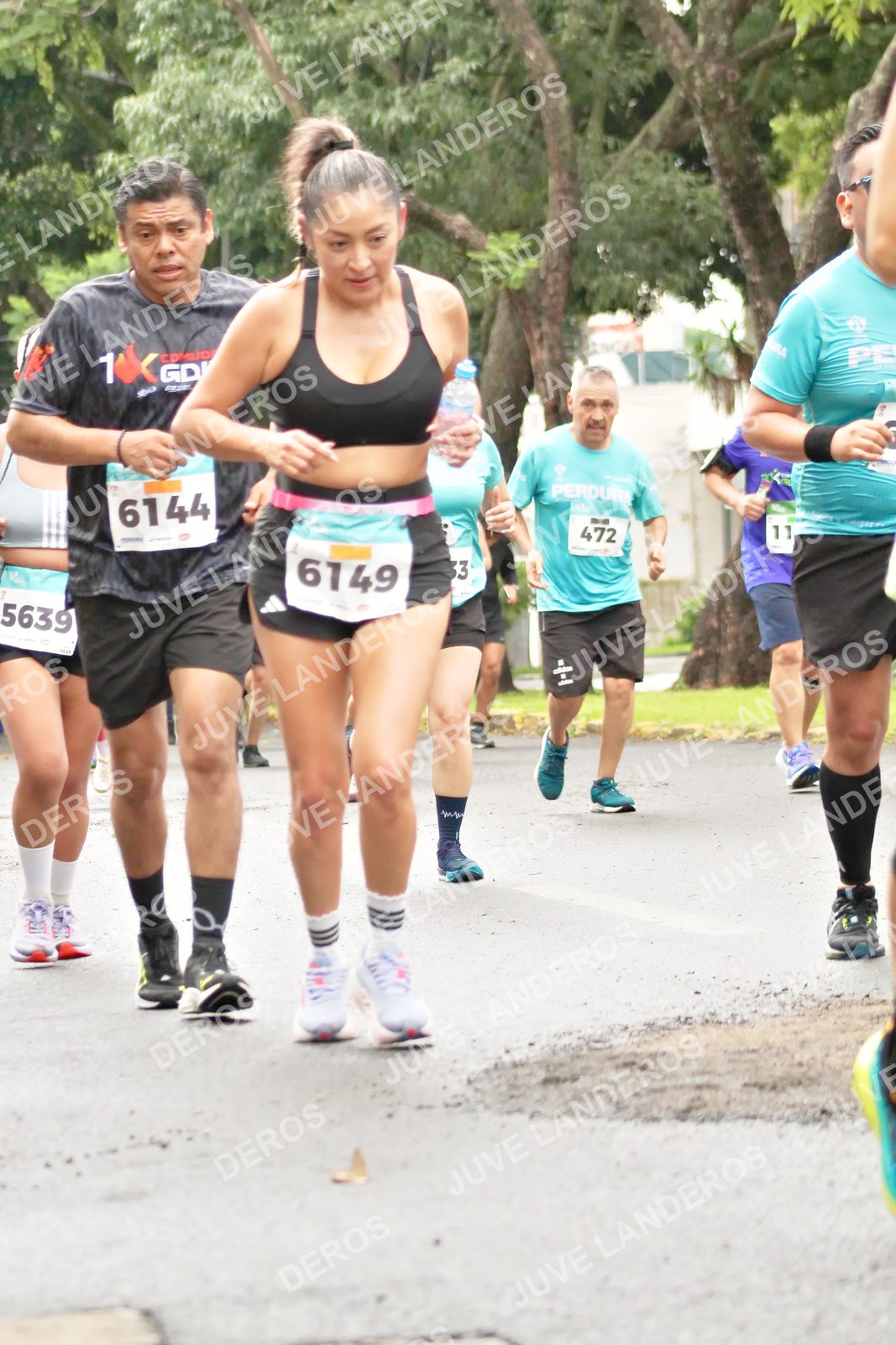 Foto del MEDIO MARATÓN ATLAS en Av. Patria, frente al Parque El Polvorín, Zapopan a las 08:39 · dorsal 6144, 5639, 6149, 472