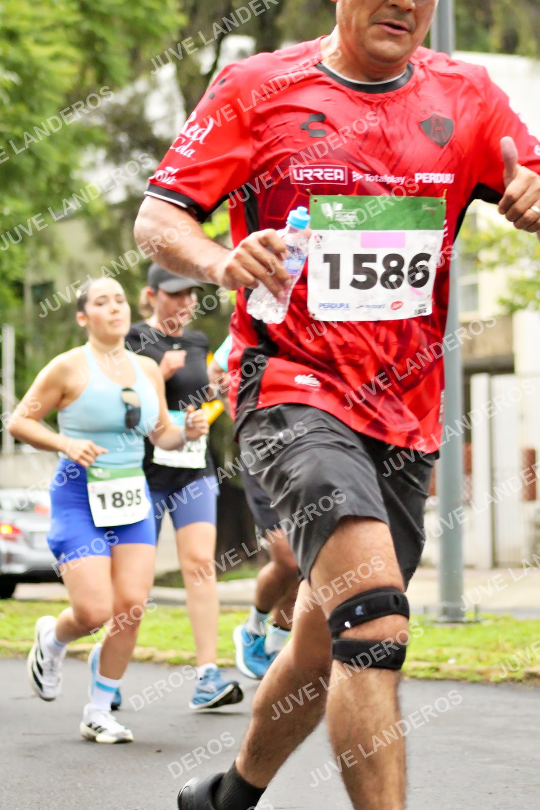 Foto del MEDIO MARATÓN ATLAS en Av. Patria, frente al Parque El Polvorín, Zapopan a las 08:29 · dorsal 1586, 1895