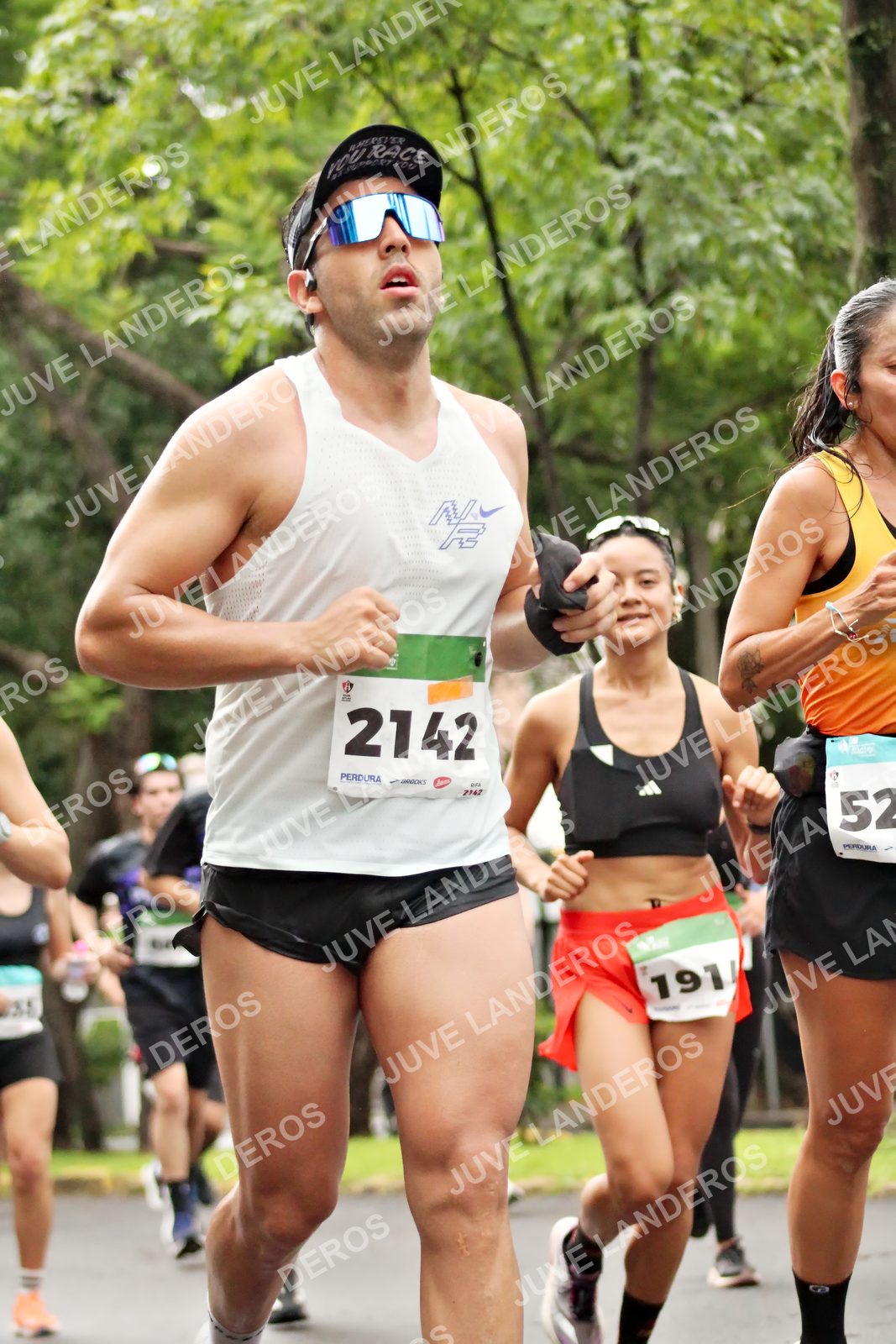Foto del MEDIO MARATÓN ATLAS en Av. Patria, frente al Parque El Polvorín, Zapopan a las 08:24 · dorsal 2142, 52, 191