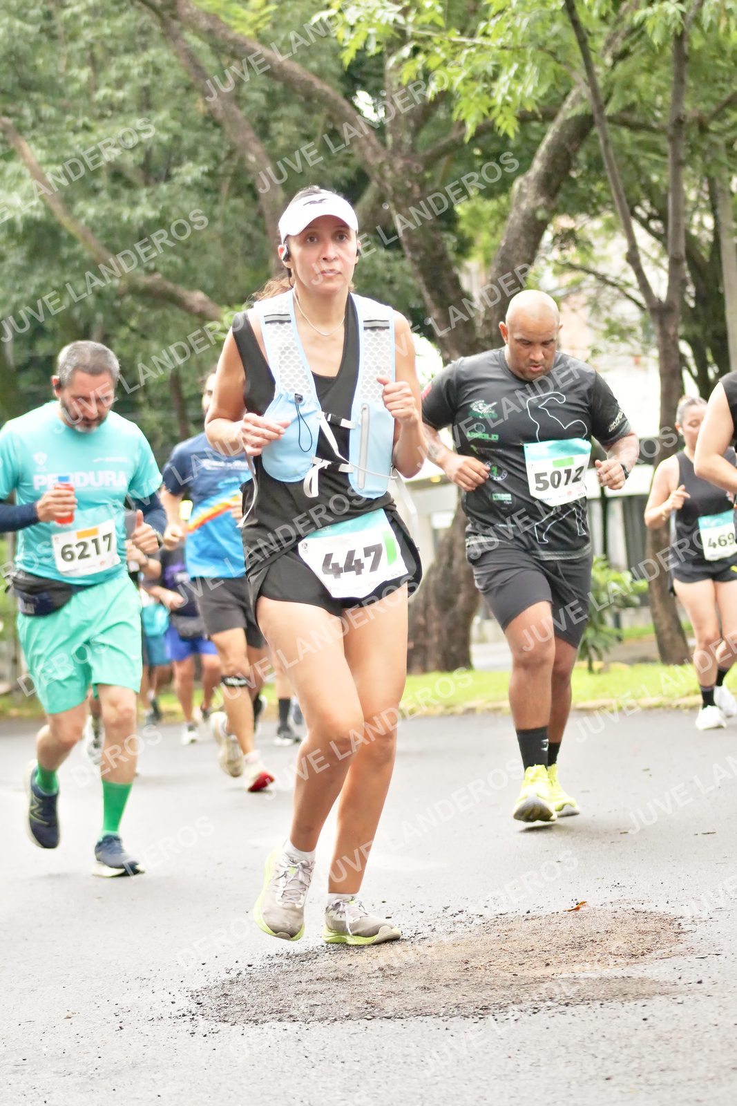Foto del MEDIO MARATÓN ATLAS en Av. Patria, frente al Parque El Polvorín, Zapopan a las 08:43 · dorsal 447, 6217, 469, 5012