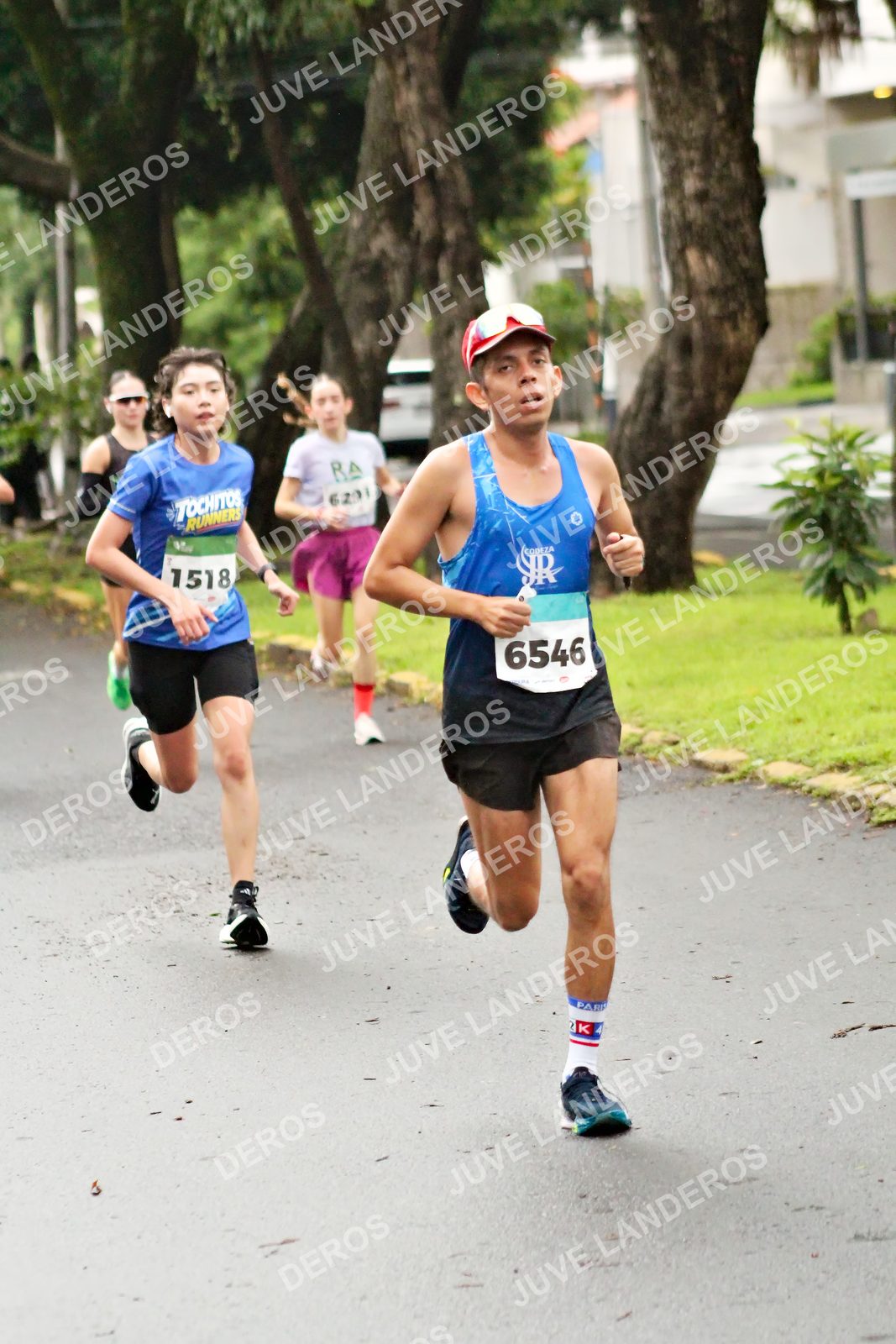 Foto del MEDIO MARATÓN ATLAS en Av. Patria, frente al Parque El Polvorín, Zapopan a las 08:04 · dorsal 6546, 1518, 6291