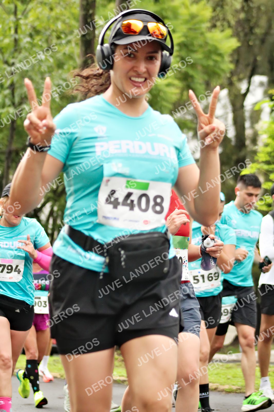 Foto del MEDIO MARATÓN ATLAS en Av. Patria, frente al Parque El Polvorín, Zapopan a las 08:38 · dorsal 4408, 794, 5169, 903
