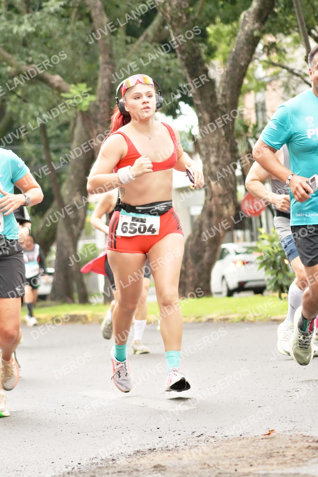 Foto del MEDIO MARATÓN ATLAS en Av. Patria, frente al Parque El Polvorín, Zapopan a las 08:44 · dorsal 6504