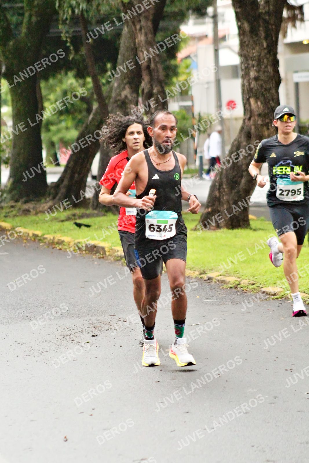 Foto del MEDIO MARATÓN ATLAS en Av. Patria, frente al Parque El Polvorín, Zapopan a las 08:03 · dorsal 6345, 2795