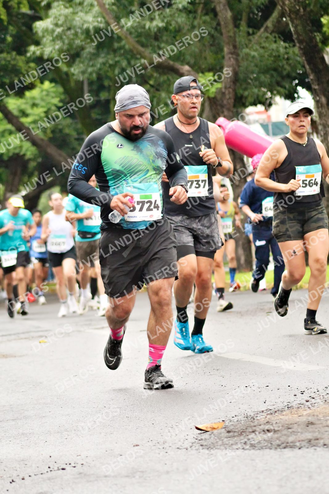 Foto del MEDIO MARATÓN ATLAS en Av. Patria, frente al Parque El Polvorín, Zapopan a las 08:27 · dorsal 737, 564, 64