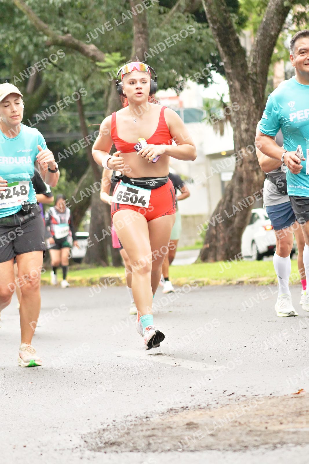 Foto del MEDIO MARATÓN ATLAS en Av. Patria, frente al Parque El Polvorín, Zapopan a las 08:44 · dorsal 6504