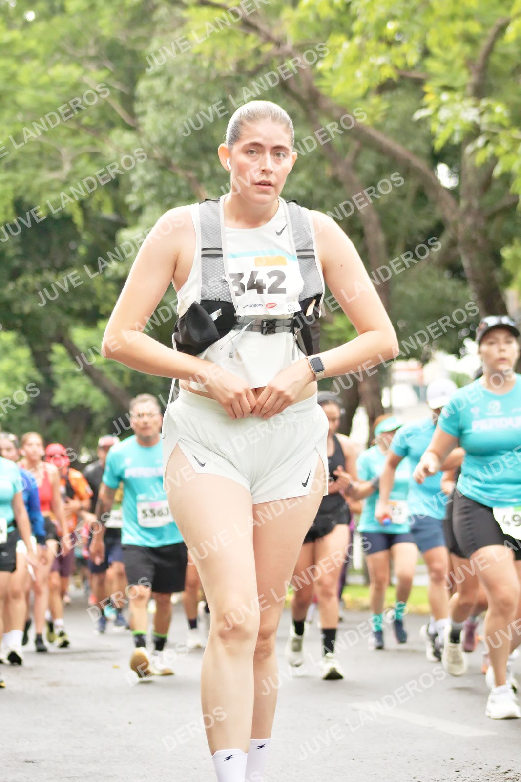 Foto del MEDIO MARATÓN ATLAS en Av. Patria, frente al Parque El Polvorín, Zapopan a las 08:44 · dorsal 342, 49