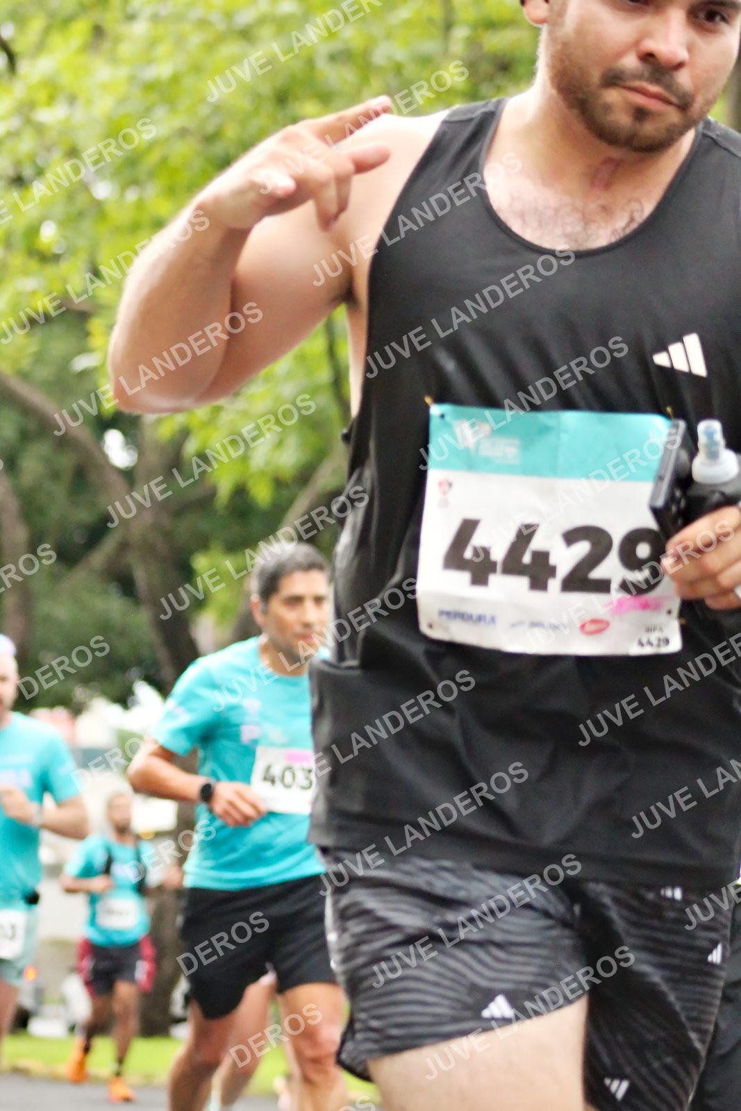 Foto del MEDIO MARATÓN ATLAS en Av. Patria, frente al Parque El Polvorín, Zapopan a las 08:31 · dorsal 4429, 403