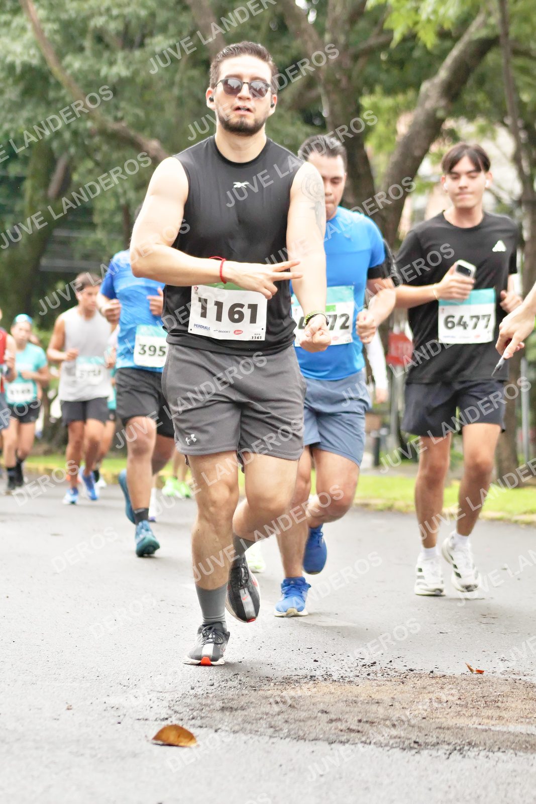 Foto del MEDIO MARATÓN ATLAS en Av. Patria, frente al Parque El Polvorín, Zapopan a las 08:38 · dorsal 1161, 6477, 395, 72