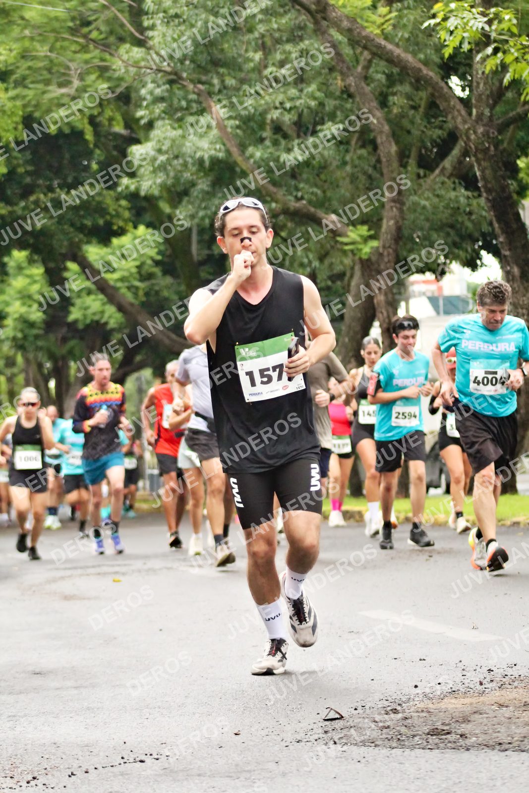 Foto del MEDIO MARATÓN ATLAS en Av. Patria, frente al Parque El Polvorín, Zapopan a las 08:22 · dorsal 157, 2594, 4004, 145