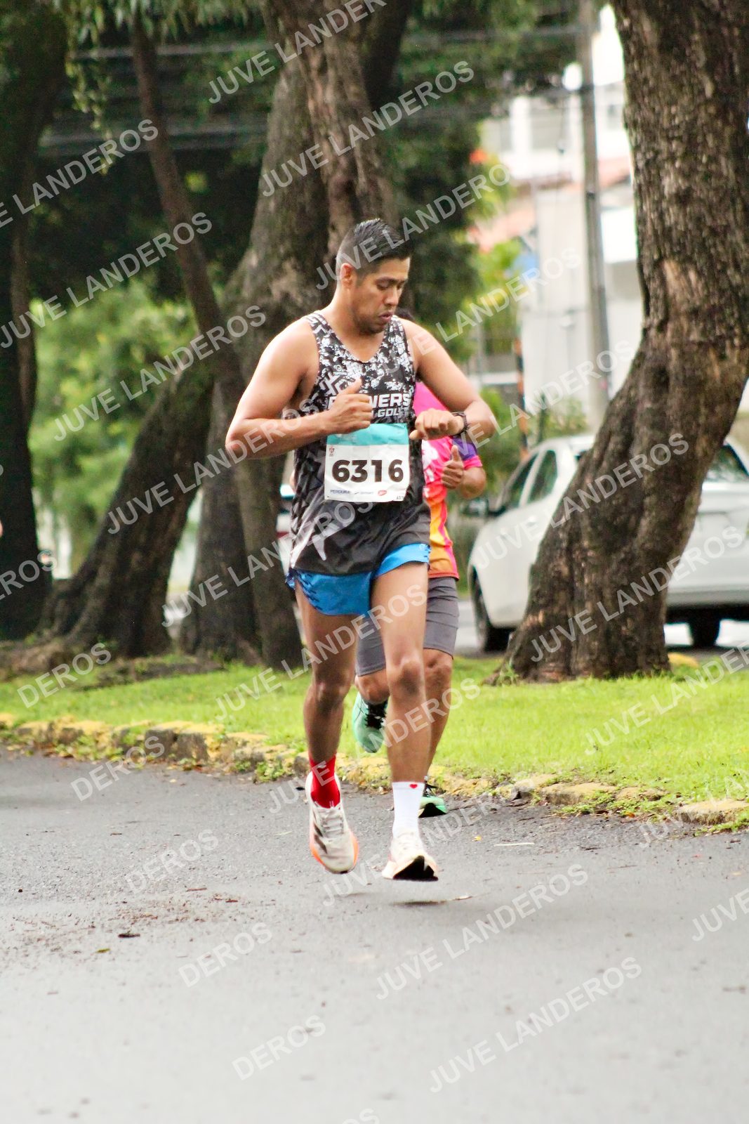 Foto del MEDIO MARATÓN ATLAS en Av. Patria, frente al Parque El Polvorín, Zapopan a las 08:04 · dorsal 6316