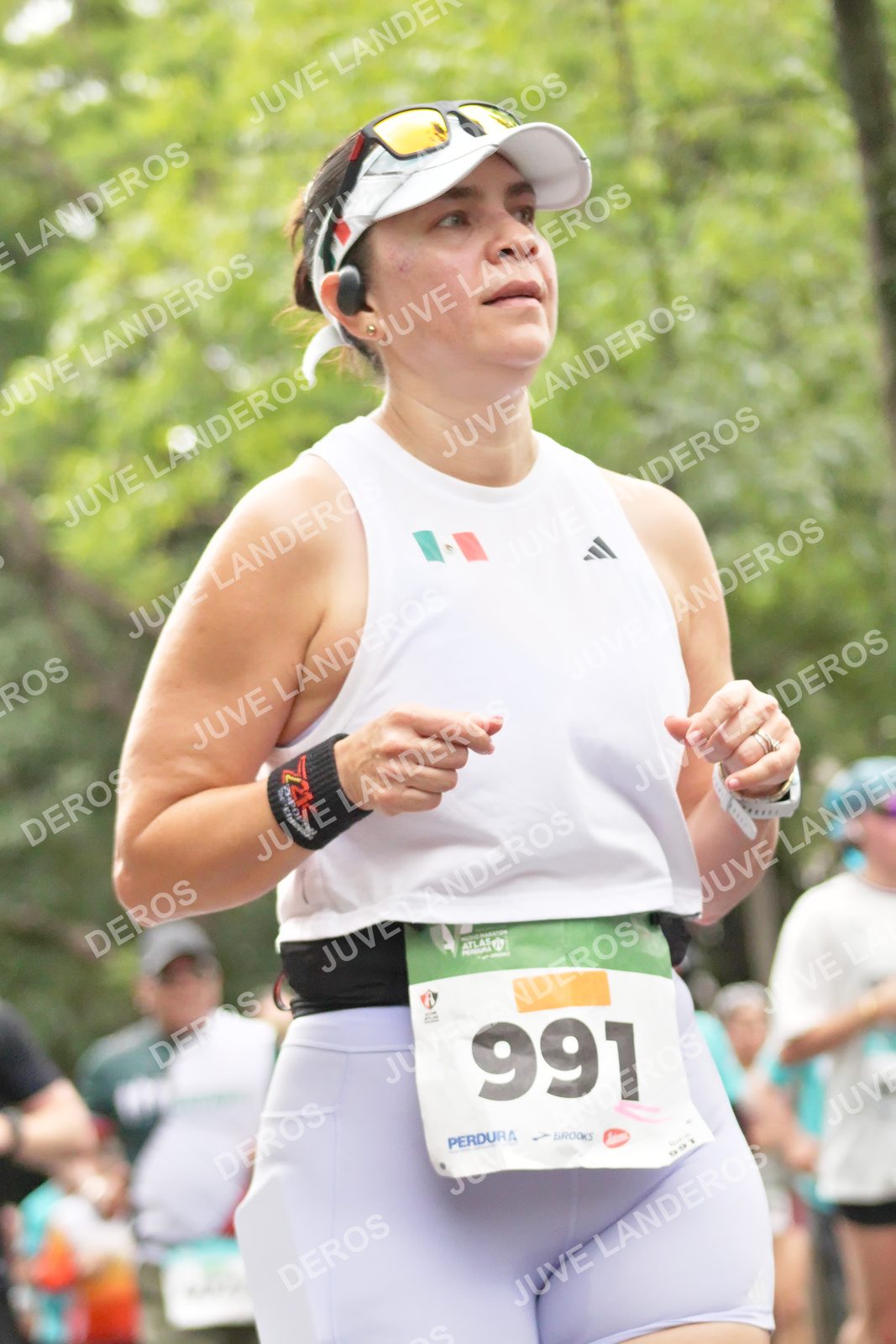 Foto del MEDIO MARATÓN ATLAS en Av. Patria, frente al Parque El Polvorín, Zapopan a las 08:28 · dorsal 991