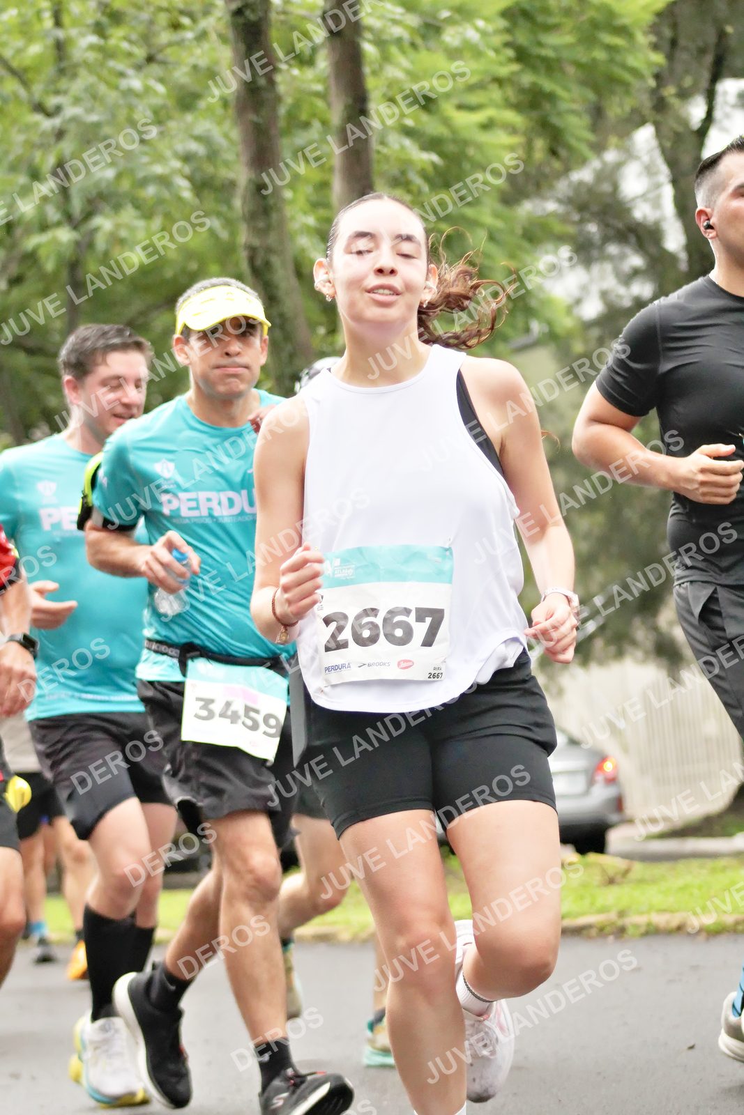 Foto del MEDIO MARATÓN ATLAS en Av. Patria, frente al Parque El Polvorín, Zapopan a las 08:27 · dorsal 2667, 3459
