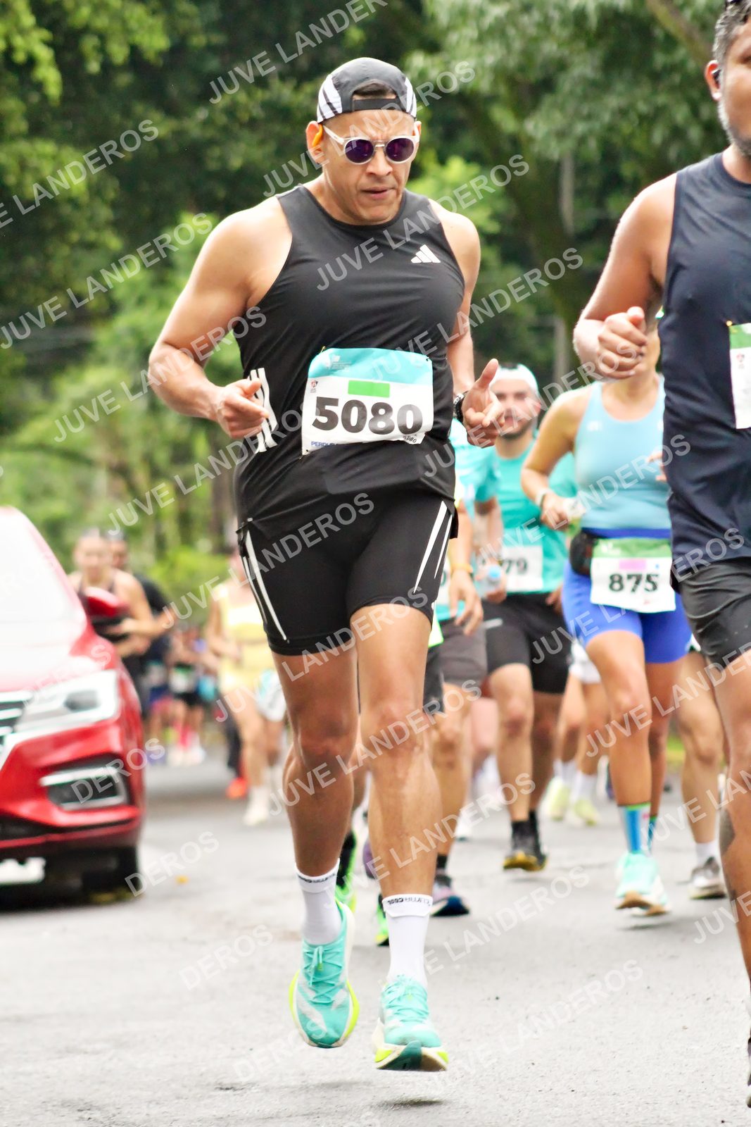 Foto del MEDIO MARATÓN ATLAS en Av. Patria, frente al Parque El Polvorín, Zapopan a las 08:32 · dorsal 875, 5080, 79