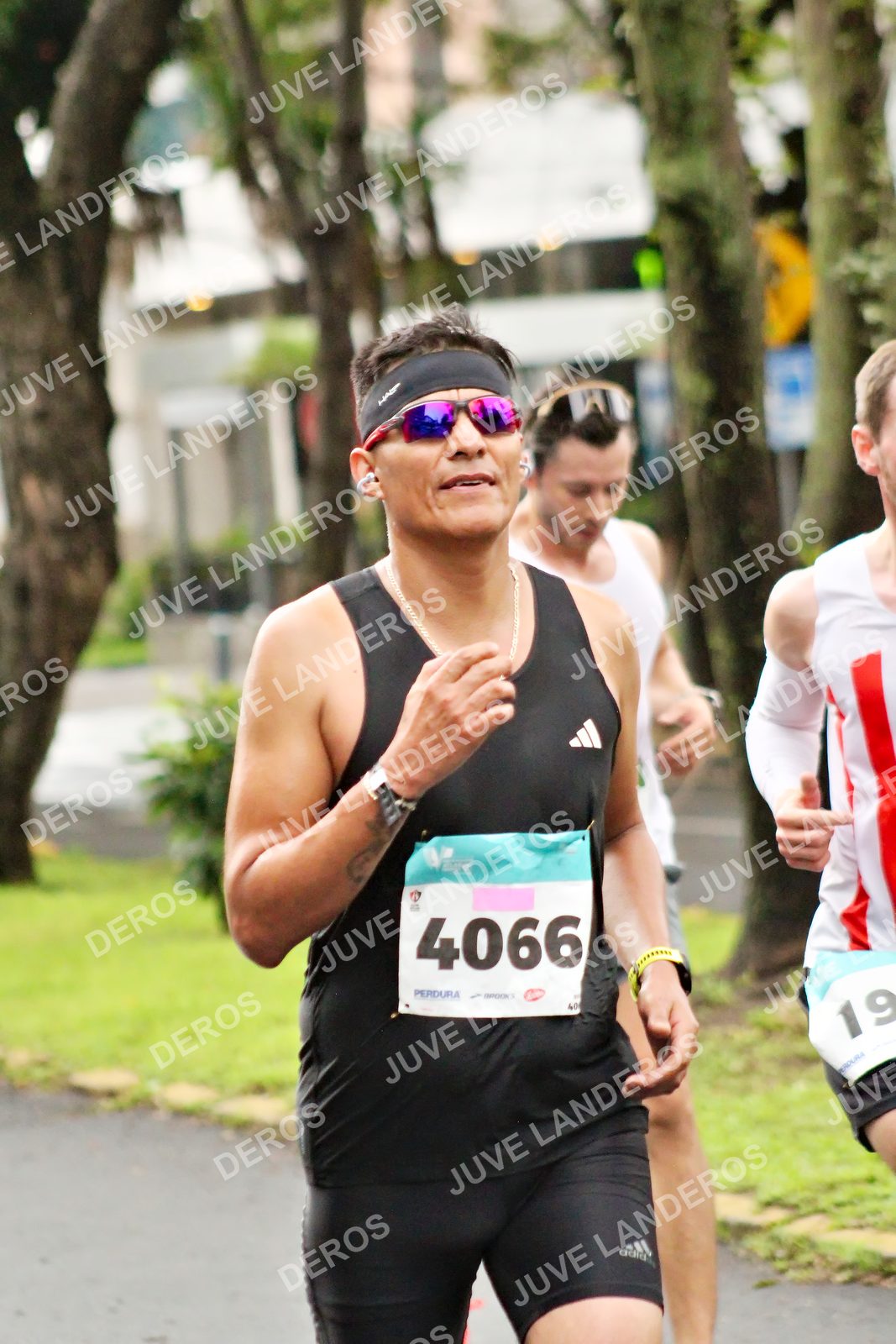 Foto del MEDIO MARATÓN ATLAS en Av. Patria, frente al Parque El Polvorín, Zapopan a las 08:07 · dorsal 4066, 19