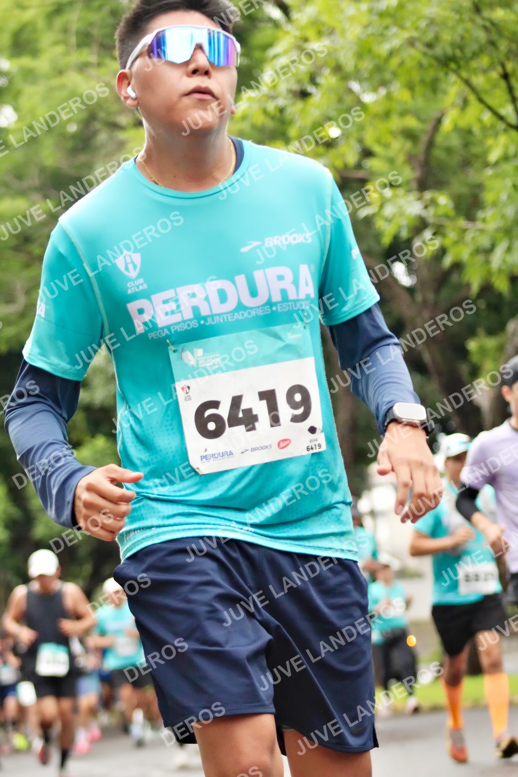 Foto del MEDIO MARATÓN ATLAS en Av. Patria, frente al Parque El Polvorín, Zapopan a las 08:34 · dorsal 6419