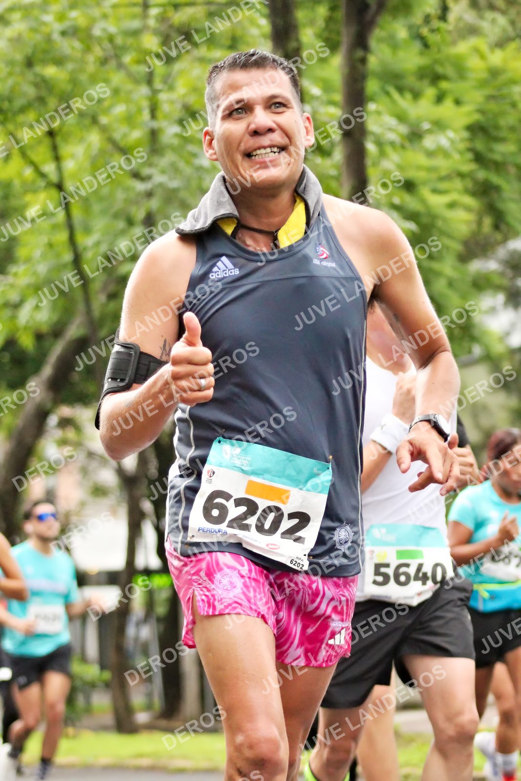 Foto del MEDIO MARATÓN ATLAS en Av. Patria, frente al Parque El Polvorín, Zapopan a las 08:24 · dorsal 5640, 6202, 667