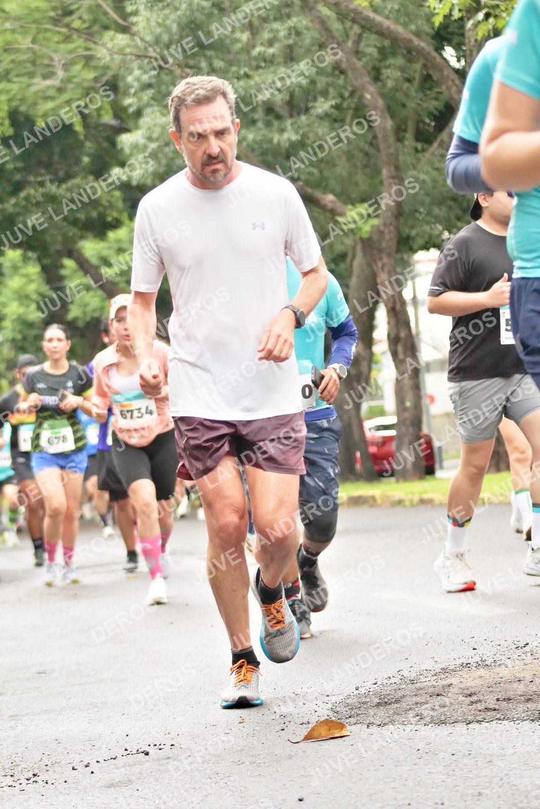 Foto del MEDIO MARATÓN ATLAS en Av. Patria, frente al Parque El Polvorín, Zapopan a las 08:38 · dorsal 678, 6734