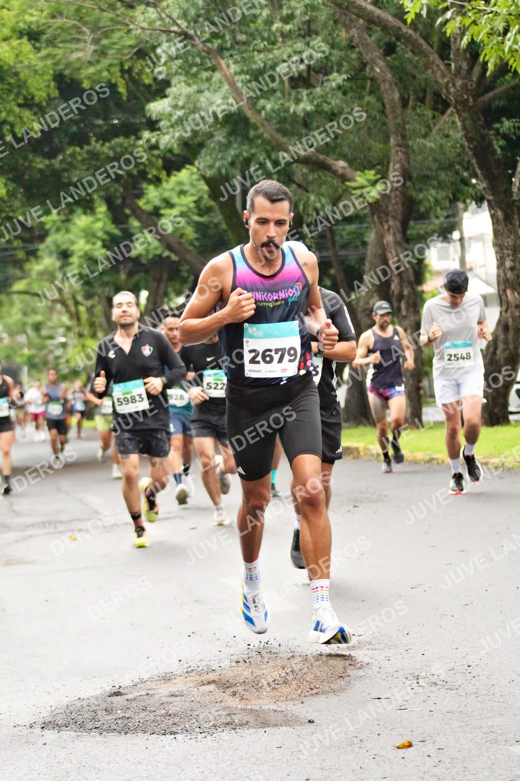 Foto del MEDIO MARATÓN ATLAS en Av. Patria, frente al Parque El Polvorín, Zapopan a las 08:13 · dorsal 2679, 2548, 5983, 522