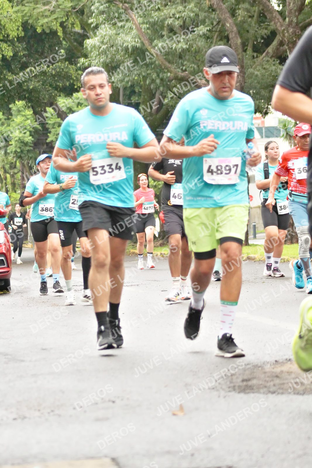 Foto del MEDIO MARATÓN ATLAS en Av. Patria, frente al Parque El Polvorín, Zapopan a las 08:40 · dorsal 4897, 5334, 46, 36