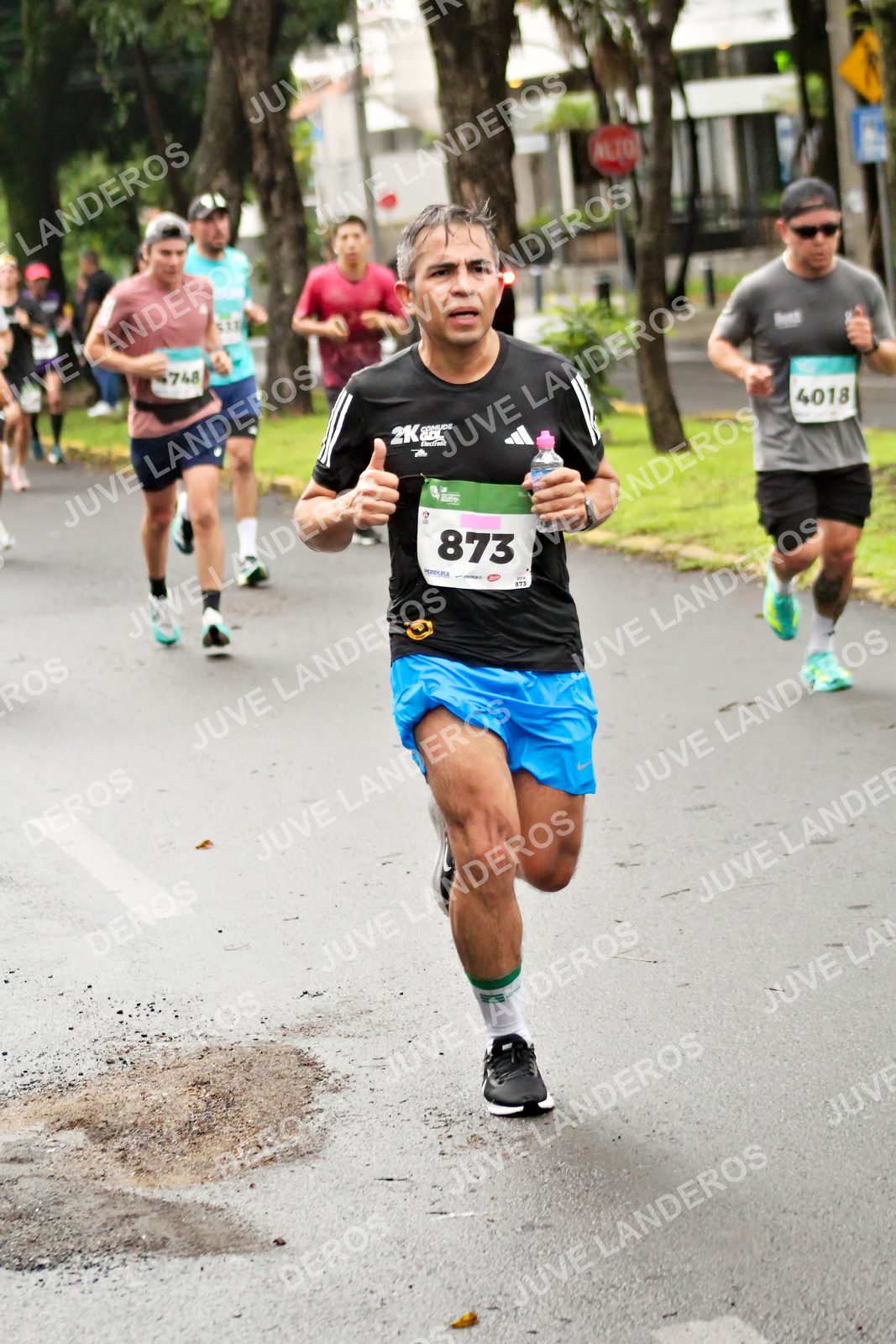 Foto del MEDIO MARATÓN ATLAS en Av. Patria, frente al Parque El Polvorín, Zapopan a las 08:14 · dorsal 873, 4018, 748