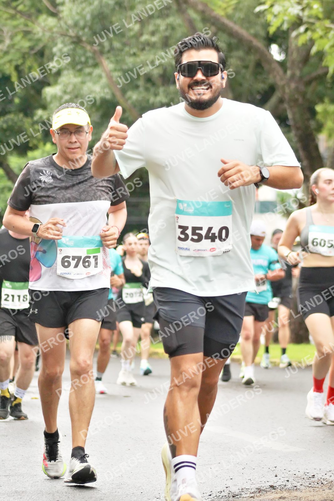 Foto del MEDIO MARATÓN ATLAS en Av. Patria, frente al Parque El Polvorín, Zapopan a las 08:35 · dorsal 6761, 3540, 2118, 605