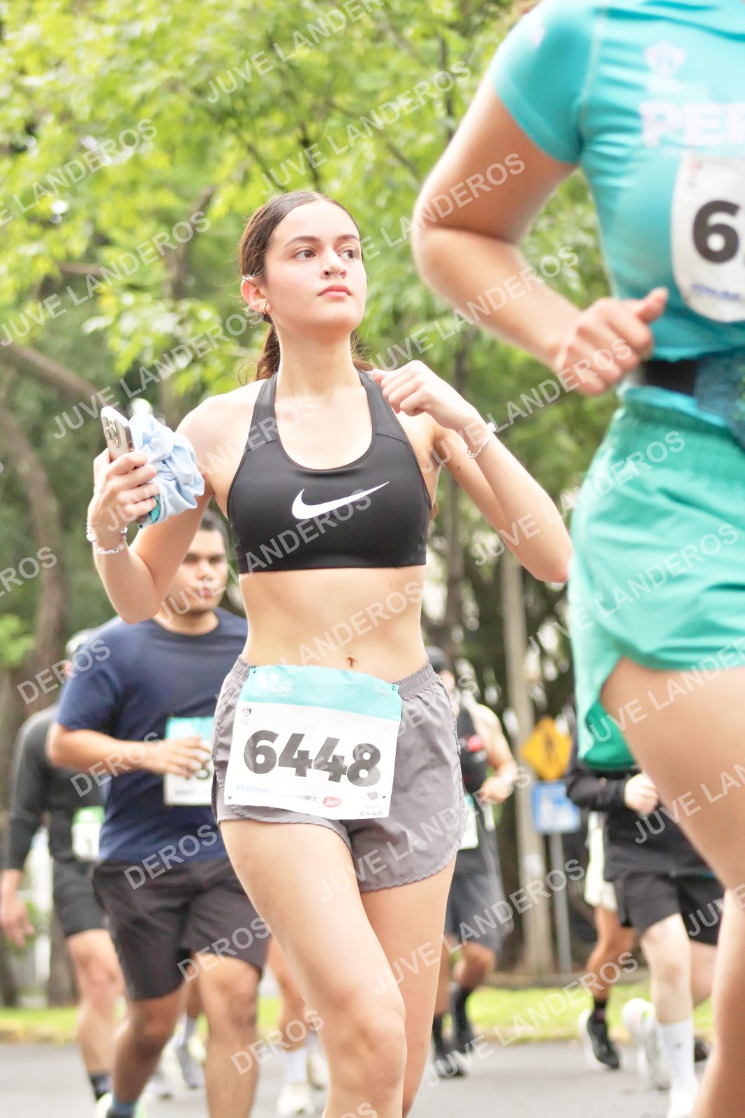Foto del MEDIO MARATÓN ATLAS en Av. Patria, frente al Parque El Polvorín, Zapopan a las 08:42 · dorsal 6448, 6