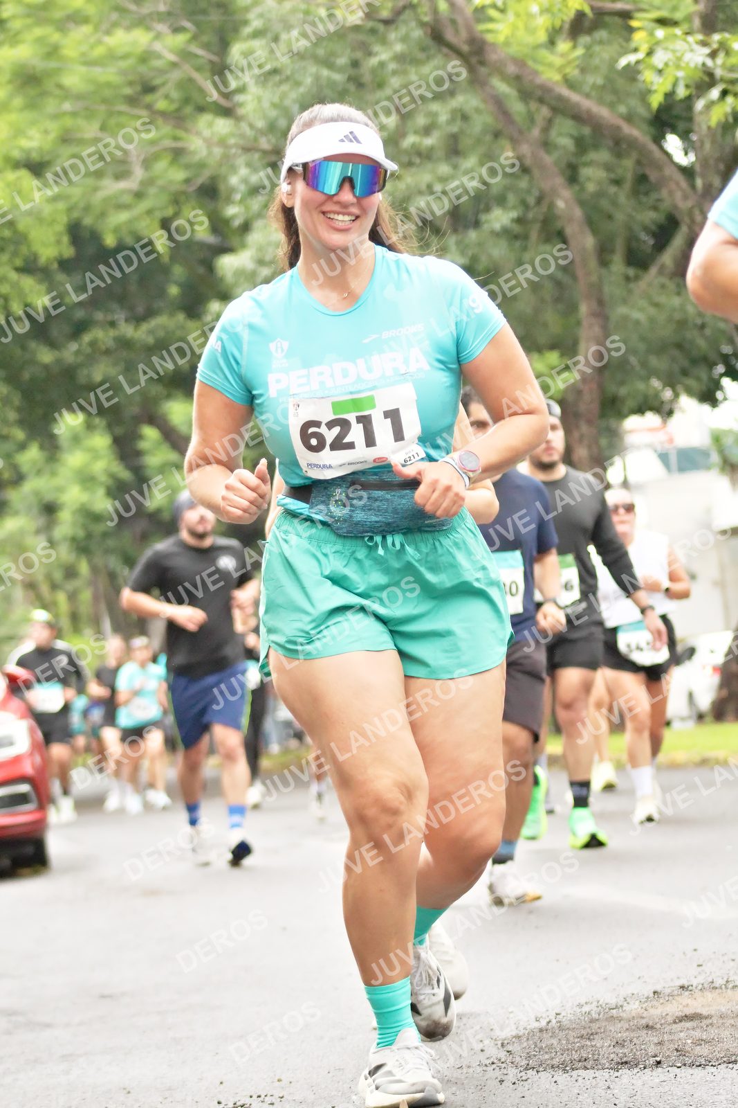Foto del MEDIO MARATÓN ATLAS en Av. Patria, frente al Parque El Polvorín, Zapopan a las 08:42 · dorsal 6211