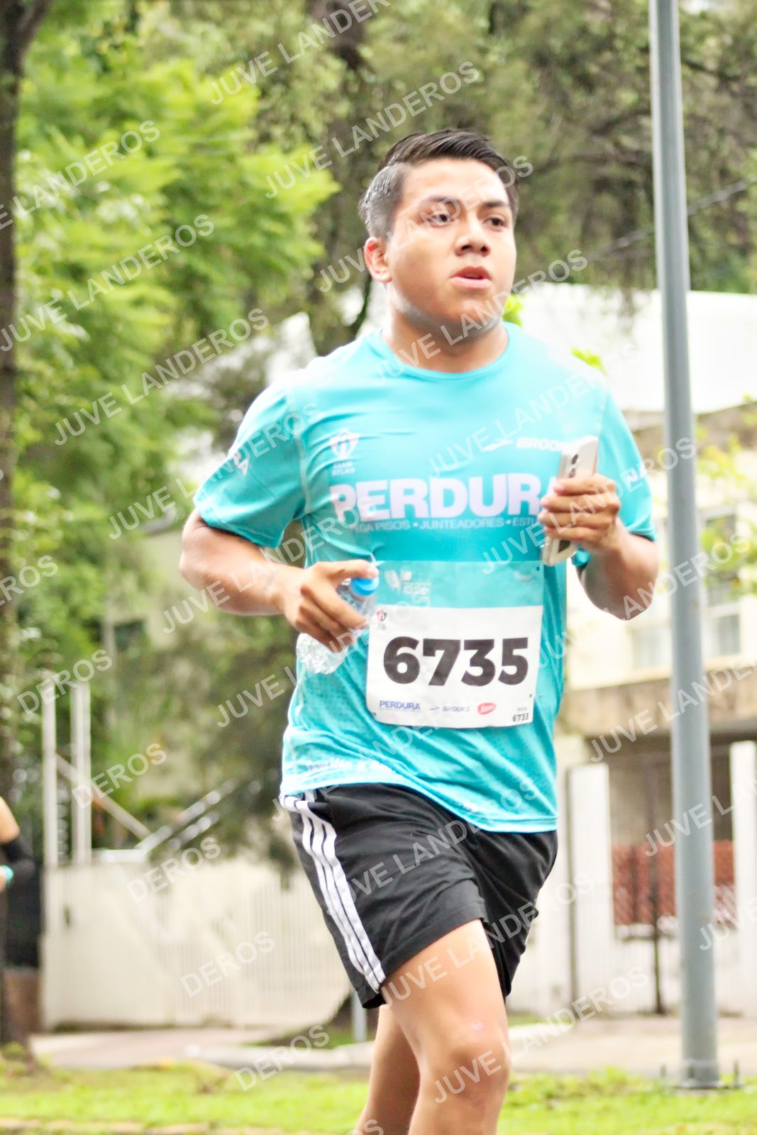 Foto del MEDIO MARATÓN ATLAS en Av. Patria, frente al Parque El Polvorín, Zapopan a las 08:22 · dorsal 6735