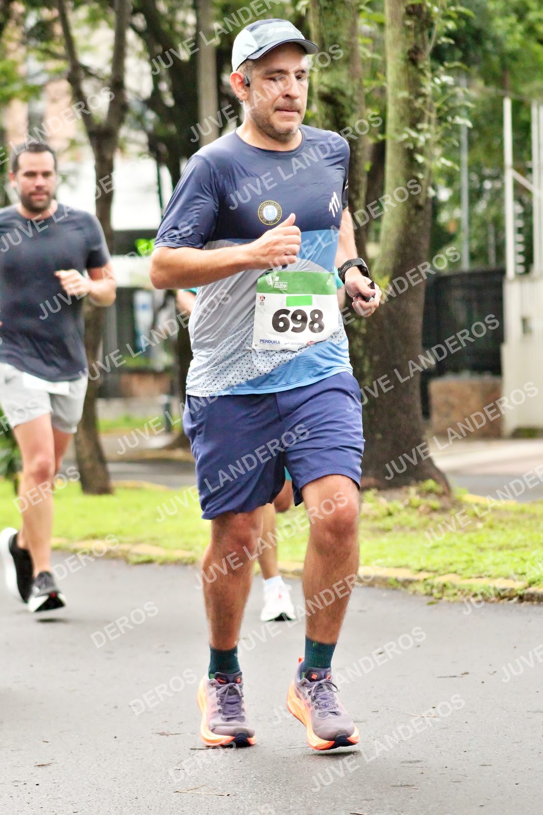 Foto del MEDIO MARATÓN ATLAS en Av. Patria, frente al Parque El Polvorín, Zapopan a las 08:18 · dorsal 698