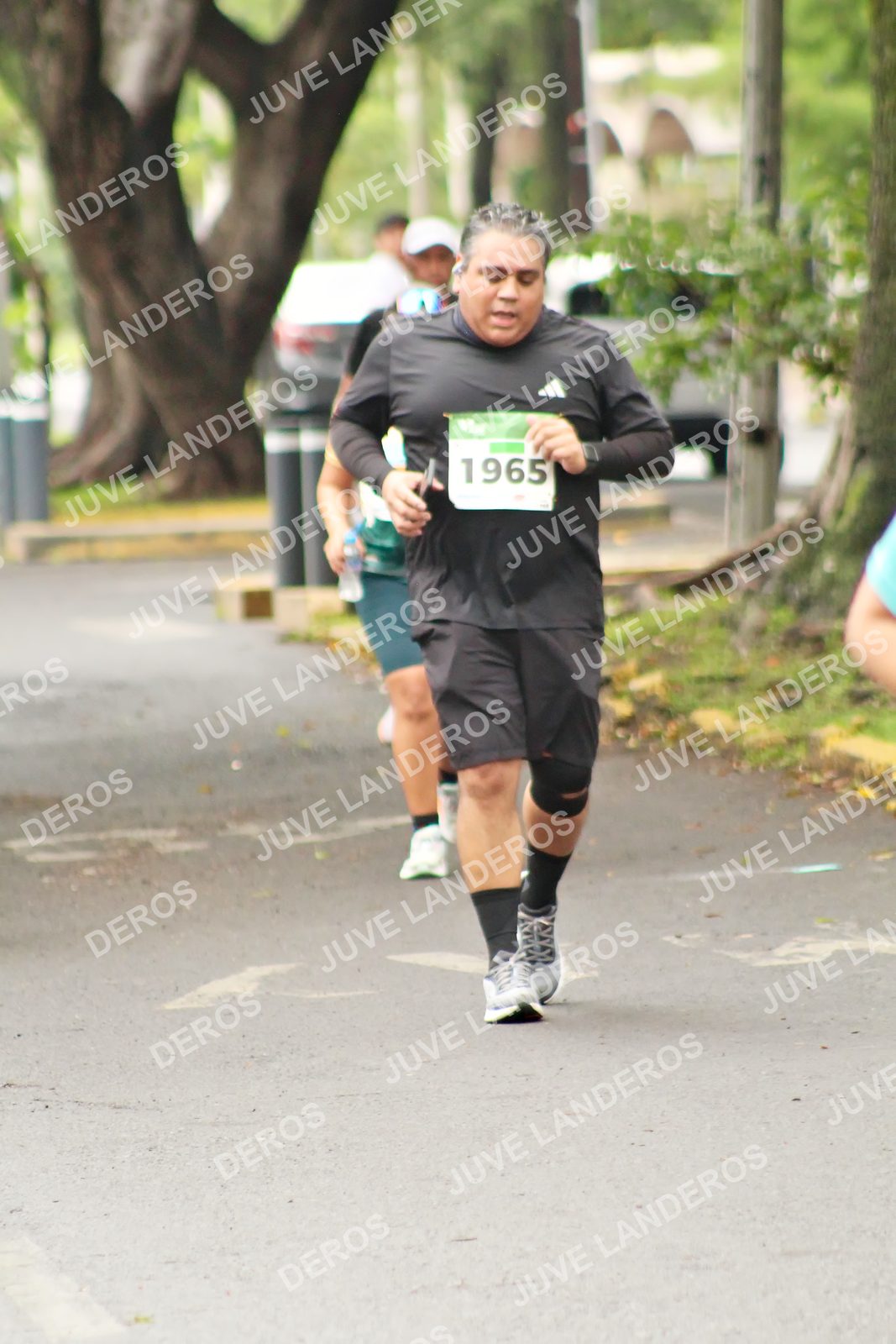 Foto del MEDIO MARATÓN ATLAS en Av. Patria, frente al Parque El Polvorín, Zapopan a las 08:56 · dorsal 1965